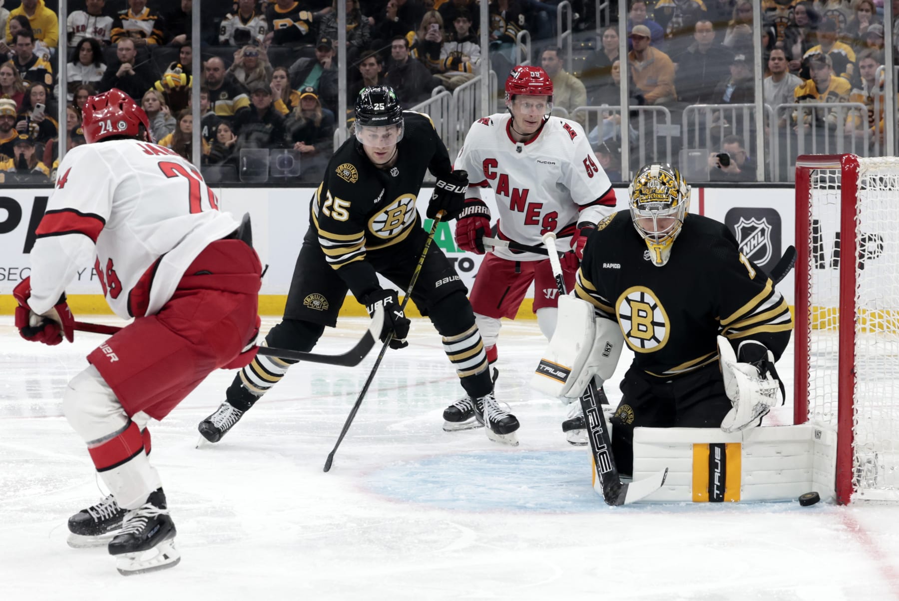 BOSTON, MA - APRIL 09: Boston Bruins goalie Jeremy Swayman (1) makes a left pad save during a game between the Boston Bruins and the Carolina Hurricanes on April 9, 2024, at TD Garden in Boston, Massachusetts. (Photo by Fred Kfoury III/Icon Sportswire via Getty Images)