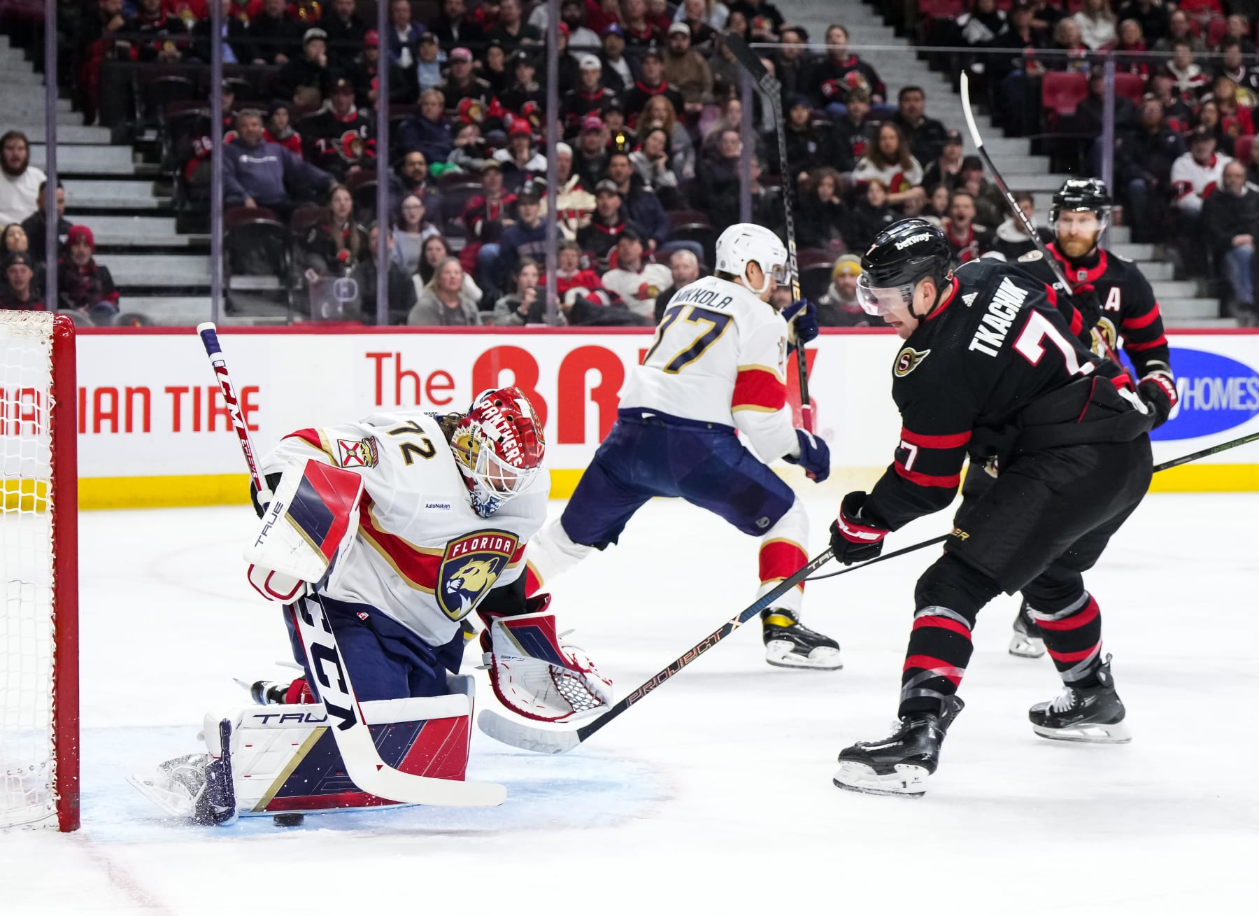 OTTAWA, CANADA - APRIL 4: Sergei Bobrovsky #72 of the Florida Panthers makes a pad save off a shot from Brady Tkachuk #7 the Ottawa Senators at Canadian Tire Centre on April 4, 2024 in Ottawa, Ontario, Canada. (Photo by Andrea Cardin/NHLI via Getty Images)