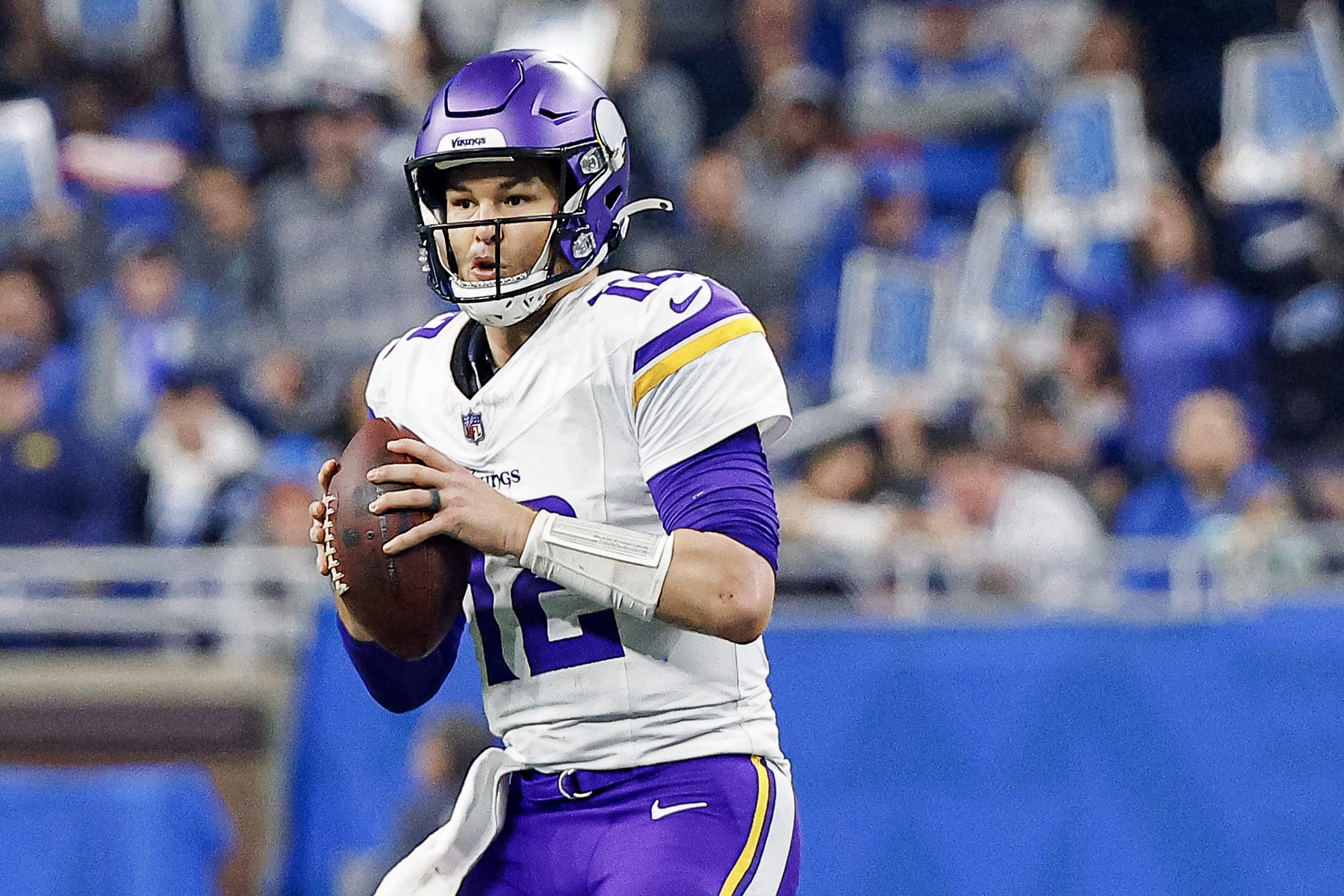 DETROIT, MICHIGAN - JANUARY 07: Nick Mullens #12 of the Minnesota Vikings looks to throw a pass during the second half of a game against the Detroit Lions at Ford Field on January 07, 2024 in Detroit, Michigan. (Photo by Mike Mulholland/Getty Images)