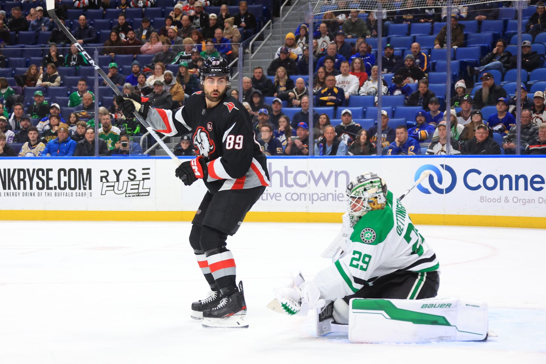 BUFFALO, NEW YORK - FEBRUARY 6: Jake Oettinger #29 of the Dallas Stars tends goal behind the screen of Alex Tuch #89 of the Buffalo Sabres during an NHL game on February 6, 2024 at KeyBank Center in Buffalo, New York. (Photo by Bill Wippert/NHLI via Getty Images)