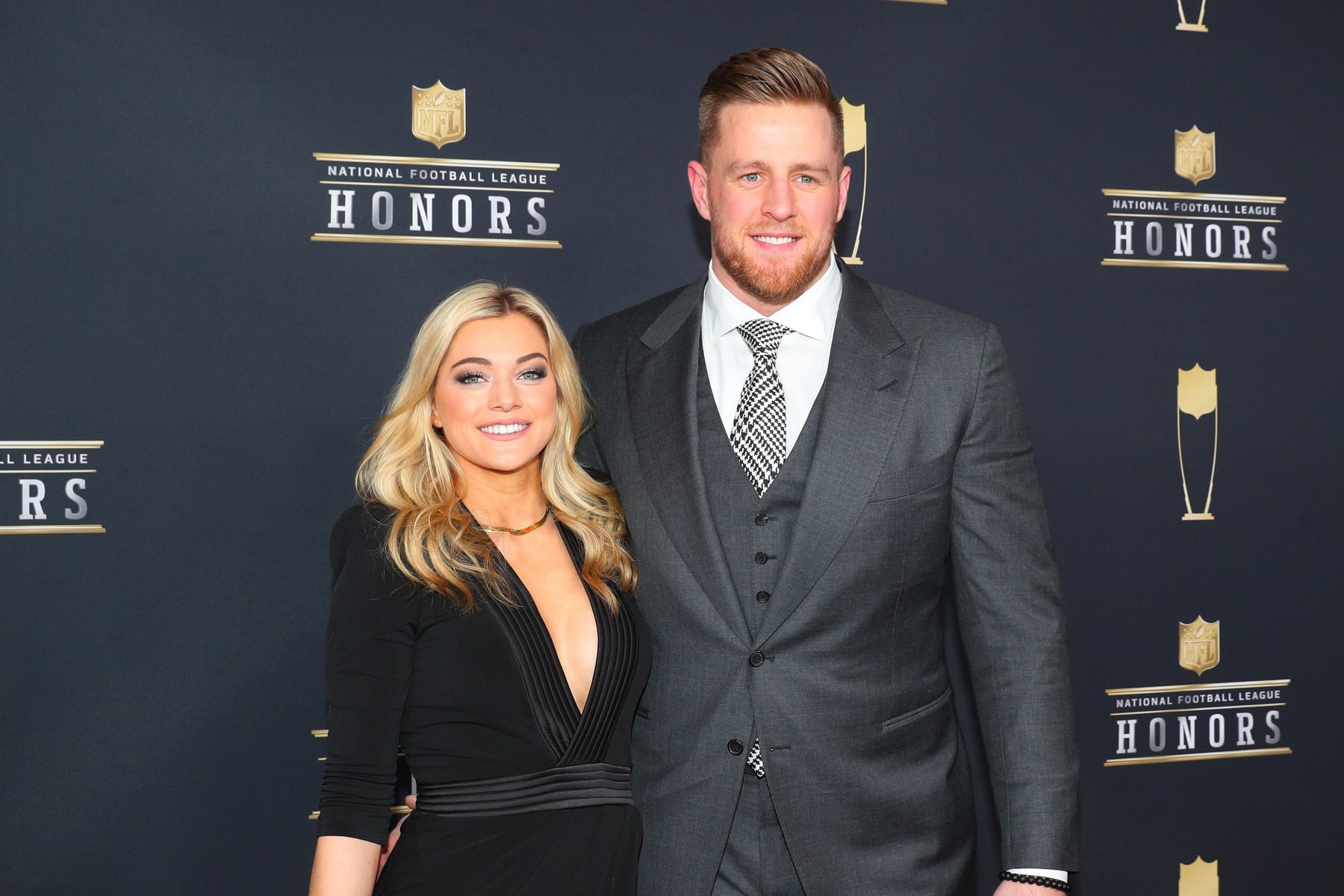 MINNEAPOLIS, MN - FEBRUARY 03: JJ Watt and girlfriend Kealia Ohai pose for Photographs on the Red Carpet at NFL Honors during Super Bowl LII week on February 3, 2018, at Northrop at the University of Minnesota in Minneapolis, MN. (Photo by Rich Graessle/Icon Sportswire via Getty Images)