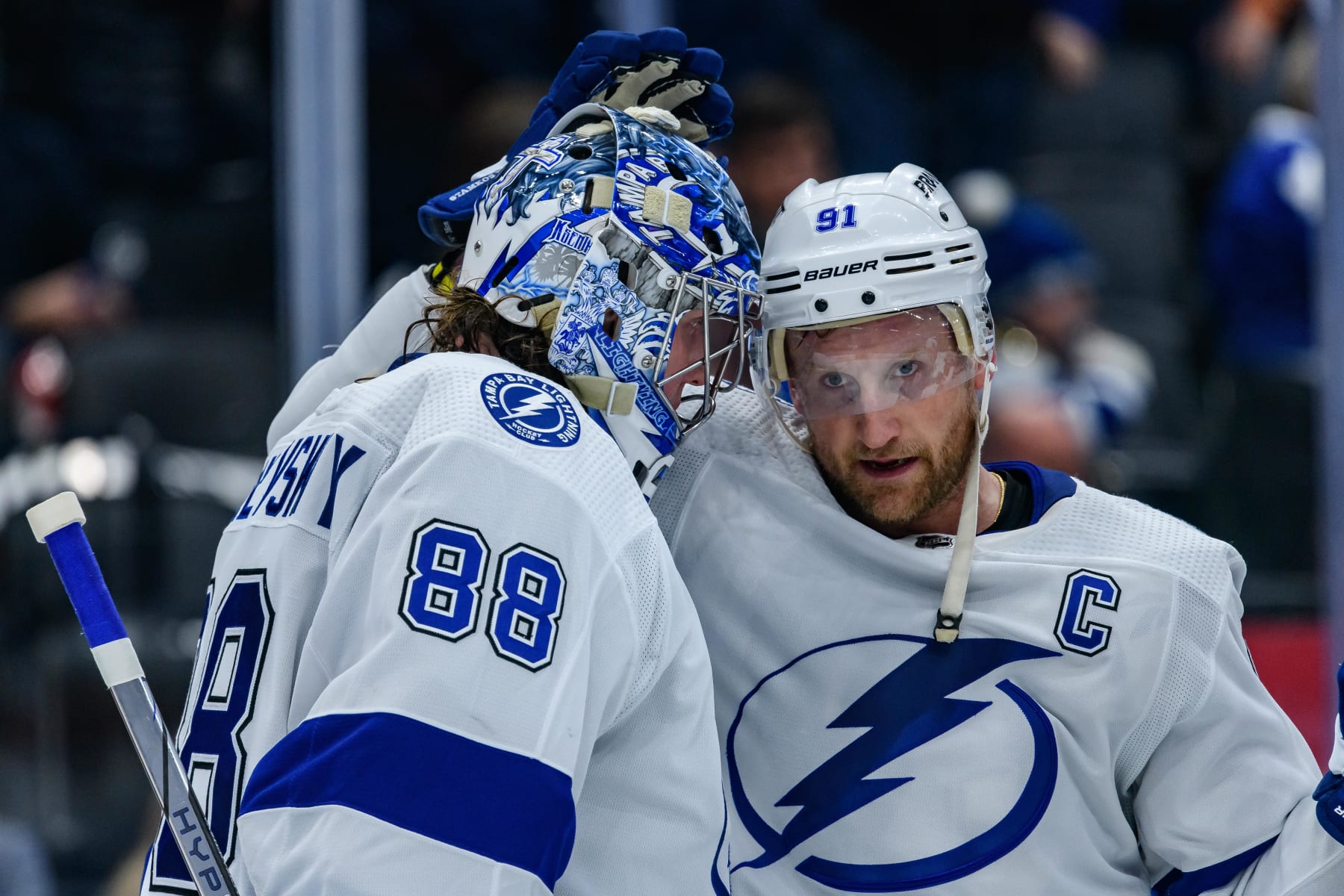 TORONTO, ON - APRIL 03: Tampa Bay Lightning Goalie Andrei Vasilevskiy (88) celebrates the win with Tampa Bay Lightning Winger Steven Stamkos (91) after the NHL regular season game between the Tampa Bay Lightning and the Toronto Maple Leafs on April 3, 2024, at Scotiabank Arena in Toronto, ON, Canada. (Photo by Julian Avram/Icon Sportswire via Getty Images)