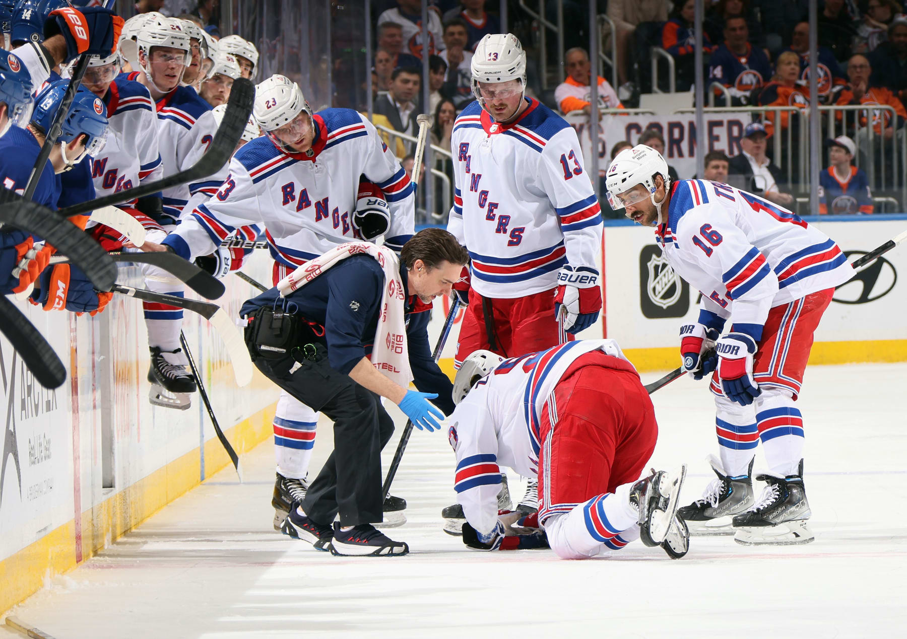 ELMONT, NEW YORK - APRIL 09: Mika Zibanejad #93 of the New York Rangers is injured during a third period collision with Adam Pelech #3 of the New York Islanders at UBS Arena on April 09, 2024 in Elmont, New York. (Photo by Bruce Bennett/Getty Images)
