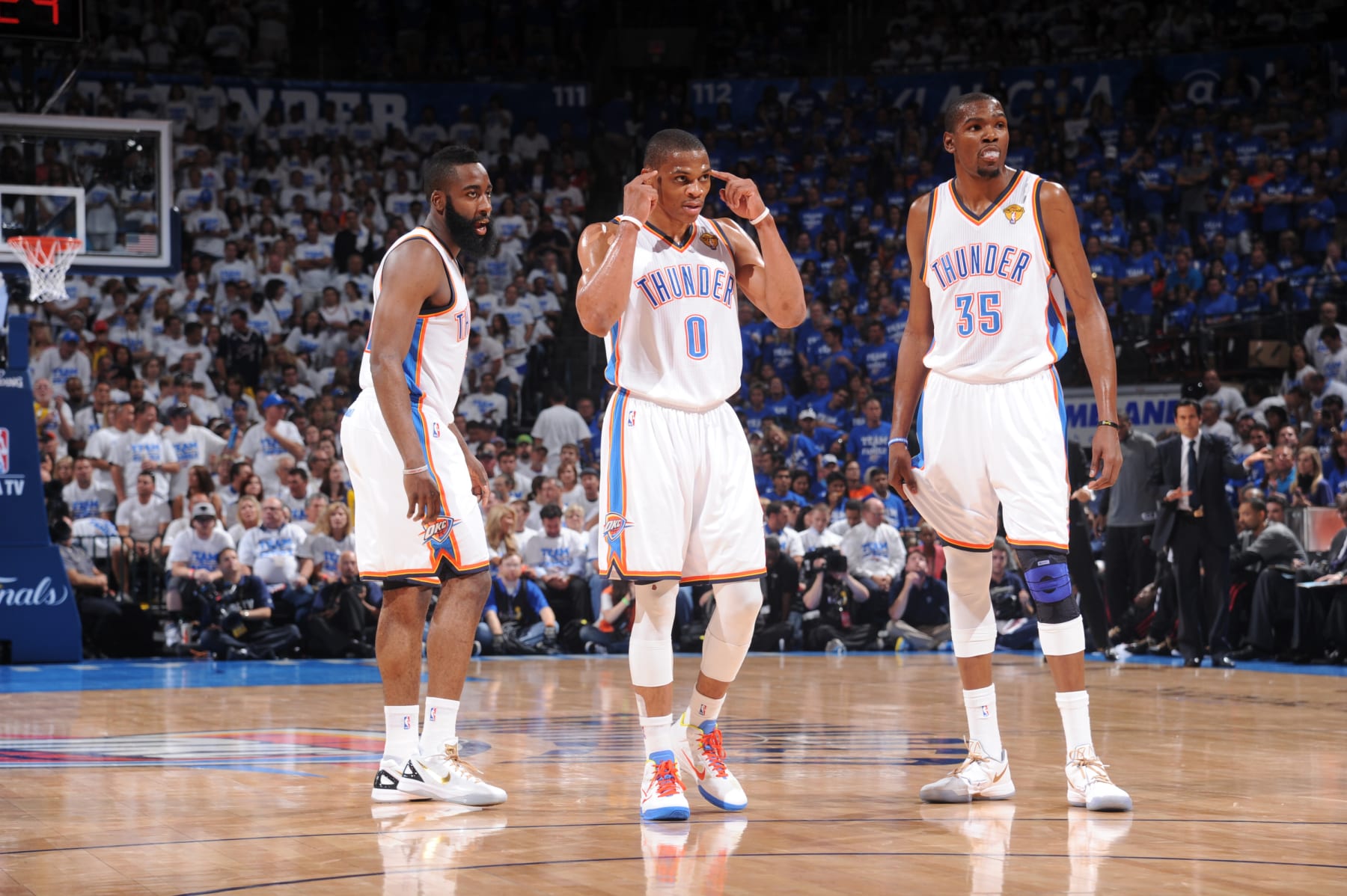 OKLAHOMA CITY, OK - JUNE 14: James Harden #13, Russell Westbrook #0 and Kevin Durant #35 of the Oklahoma City Thunder gets the play against the Miami Heat during Game Two of the 2012 NBA Finals at Chesapeake Energy Arena on June 14, 2012 in Oklahoma City, Oklahoma. NOTE TO USER: User expressly acknowledges and agrees that, by downloading and or using this Photograph, user is consenting to the terms and conditions of the Getty Images License Agreement. Mandatory Copyright Notice: Copyright 2012 NBAE (Photo by Garrett Ellwood/NBAE via Getty Images)