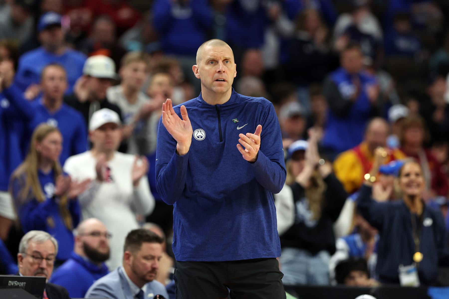 OMAHA, NEBRASKA - MARCH 21: Head coach Mark Pope of the Brigham Young Cougars looks on during the game against the Duquesne Dukes in the first round of the NCAA Men's Basketball Tournament at CHI Health Center on March 21, 2024 in Omaha, Nebraska. (Photo by Jamie Squire/Getty Images)