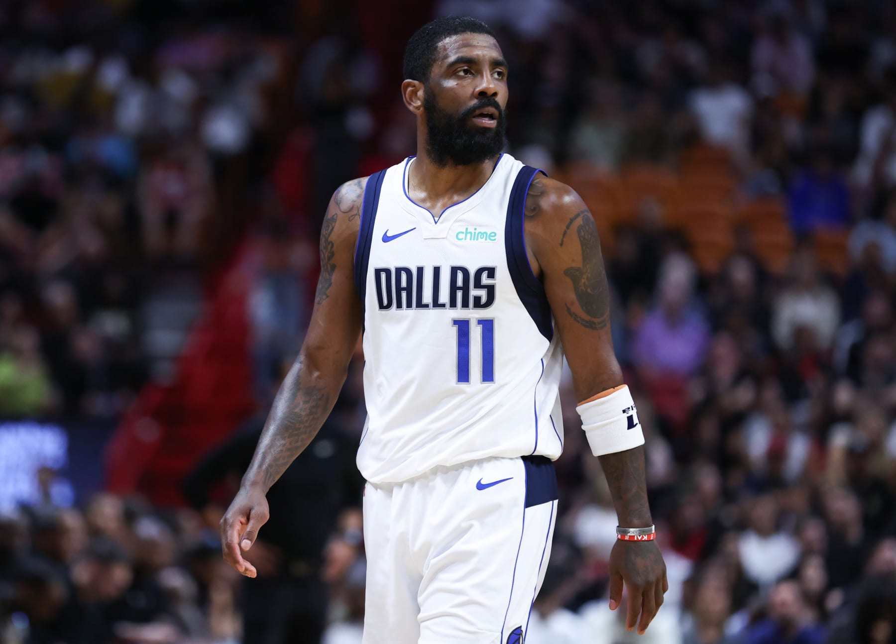 MIAMI, FLORIDA - APRIL 10: Kyrie Irving #11 of the Dallas Mavericks looks on against the Miami Heat during the second quarter of the game at Kaseya Center on April 10, 2024 in Miami, Florida. NOTE TO USER: User expressly acknowledges and agrees that, by downloading and or using this photograph, User is consenting to the terms and conditions of the Getty Images License Agreement. (Photo by Megan Briggs/Getty Images)