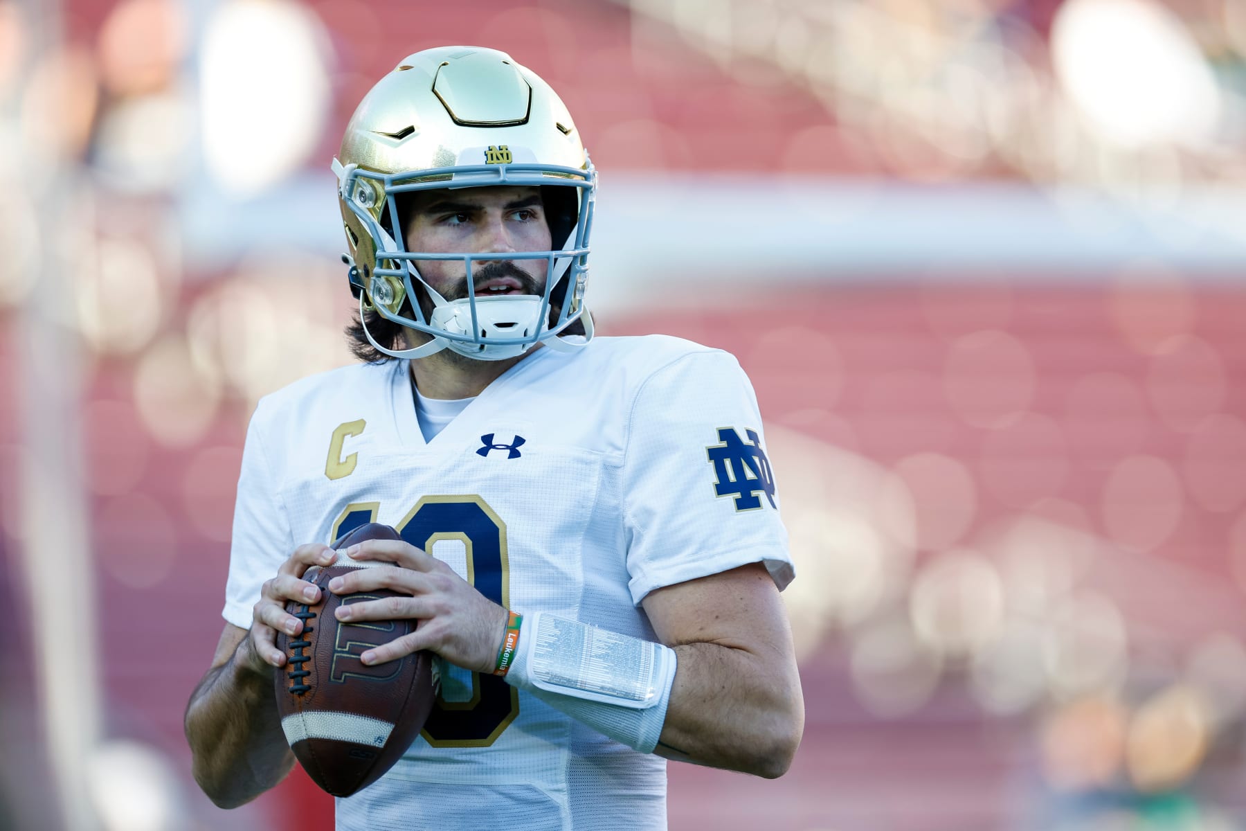 STANFORD, CALIFORNIA - NOVEMBER 25: Sam Hartman #10 of the Notre Dame Fighting Irish warms up prior to a game against the Stanford Cardinal at Stanford Stadium on November 25, 2023 in Stanford, California. (Photo by Brandon Sloter/Image Of Sport/Getty Images)