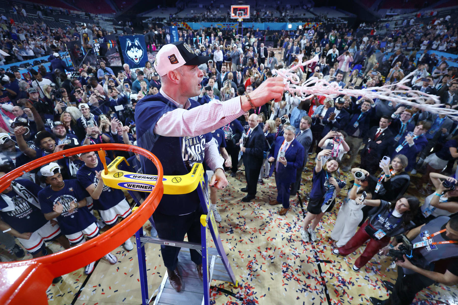 GLENDALE, ARIZONA - APRIL 08: head coach Dan Hurley of the Connecticut Huskies celebrates after defeating the Purdue Boilermakers in the NCAA Men's Basketball Tournament National Championship game at State Farm Stadium on April 08, 2024 in Glendale, Arizona. (Photo by Jamie Schwaberow/NCAA Photos via Getty Images)