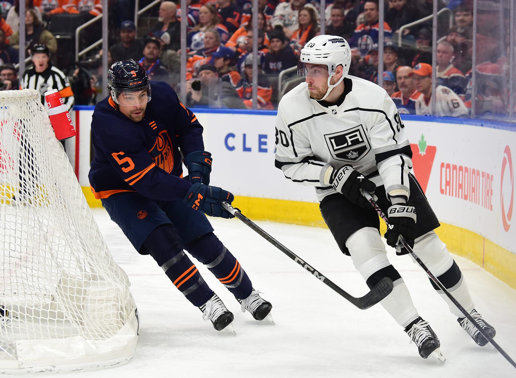 EDMONTON, CANADA - MARCH 28: Pierre-Luc Dubois #80 of the Los Angeles Kings skates against Cody Ceci #5 of the Edmonton Oilers during the game at Rogers Place on March 28, 2024, in Edmonton, Alberta, Canada. (Photo by Leila Devlin/Getty Images)