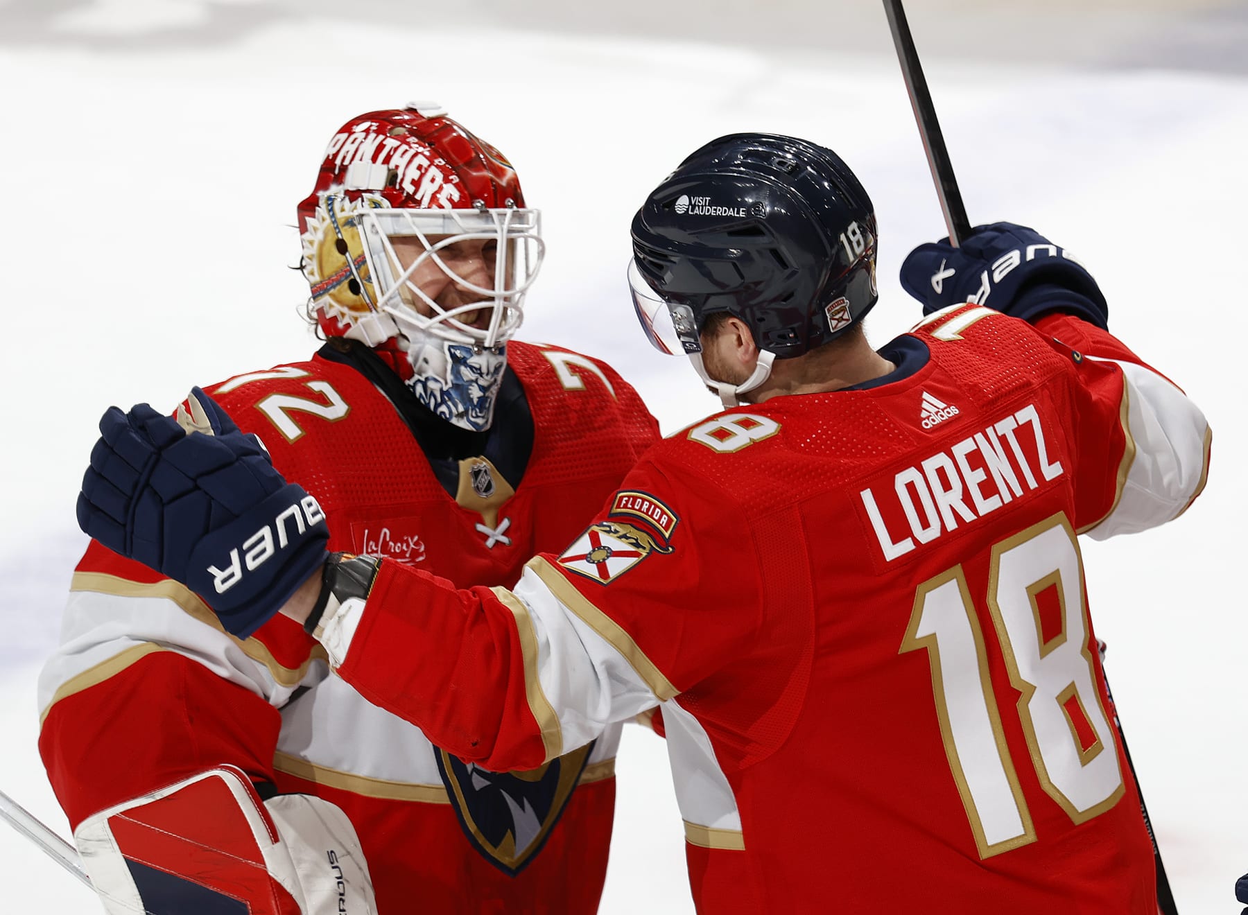 SUNRISE, FL - APRIL 13: Goaltender Sergei Bobrovsky #72 and Steven Lorentz #18 of the Florida Panthers celebrate the 3-2 overtime win against the Buffalo Sabres at the Amerant Bank Arena on April 13, 2024 in Sunrise, Florida. (Photo by Joel Auerbach/Getty Images)