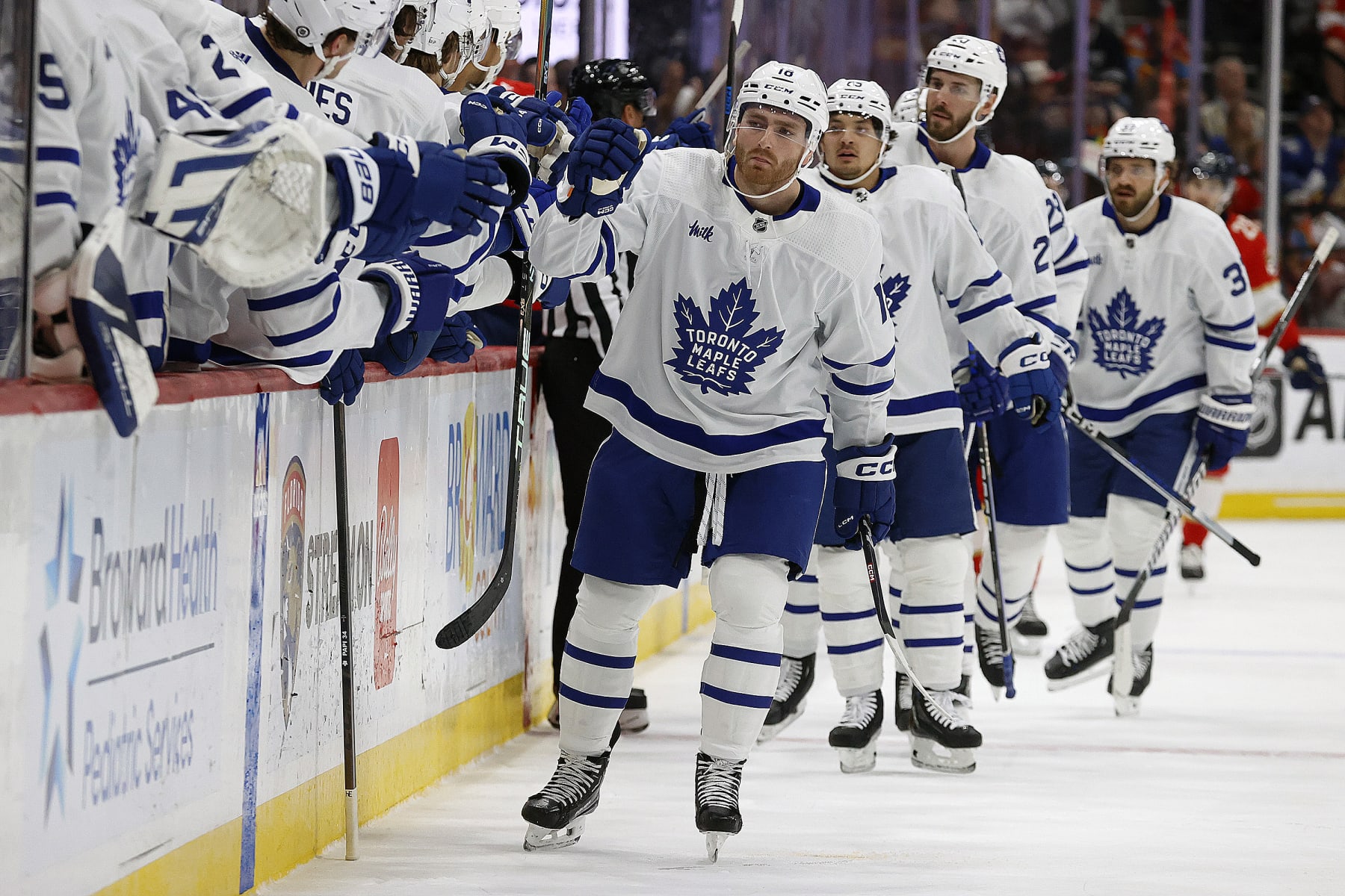 SUNRISE, FLORIDA - APRIL 16: Noah Gregor #18 of the Toronto Maple Leafs celebrates his goal with teammates during the first period against the Florida Panthers at the Amerant Bank Arena on April 16, 2024 in Sunrise, Florida. (Photo by Eliot J. Schechter/NHLI via Getty Images)