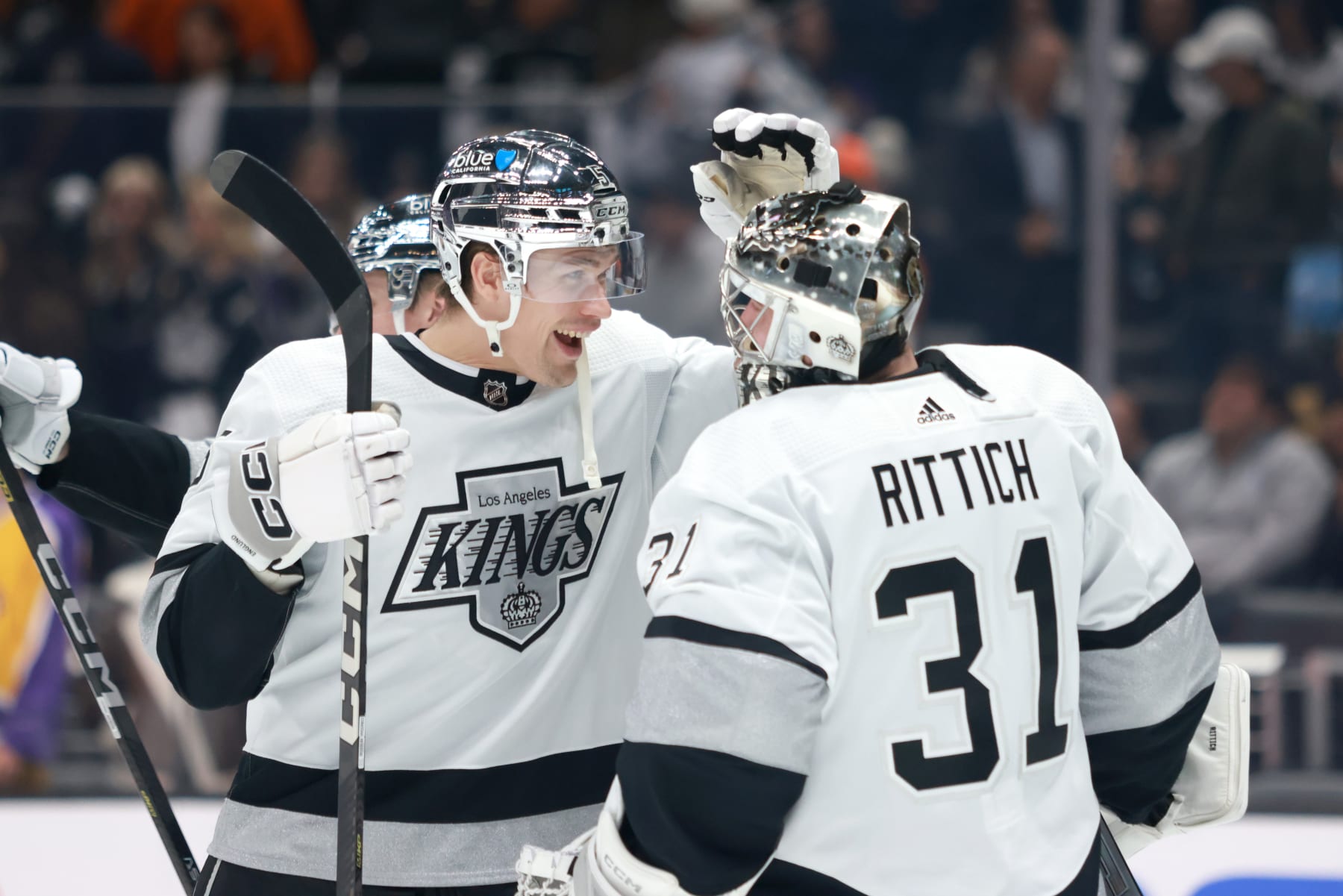 LOS ANGELES, CALIFORNIA - APRIL 13: Andreas Englund #5 and David Rittich #31 of the Los Angeles Kings celebrate the 3-1 victory over the Anaheim Ducks after the game at Crypto.com Arena on April 13, 2024 in Los Angeles, California. (Photo by Nicole Vasquez/NHLI via Getty Images)