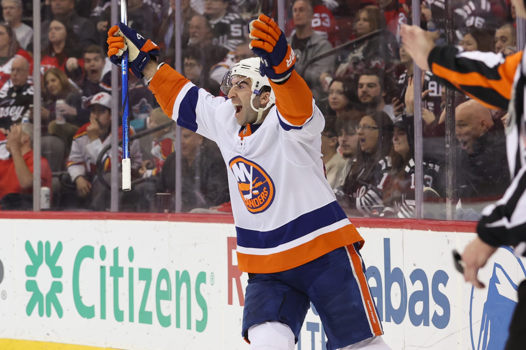 NEWARK, NJ - APRIL 15: New York Islanders center Kyle Palmieri (21) celebrates after New York Islanders center Brock Nelson (29) (not pictured) scores a goal during a game between the New York Islanders and New Jersey Devils on April 15, 2024 at Prudential Center in the Newark, New Jersey. (Photo by Andrew Mordzynski/Icon Sportswire via Getty Images)