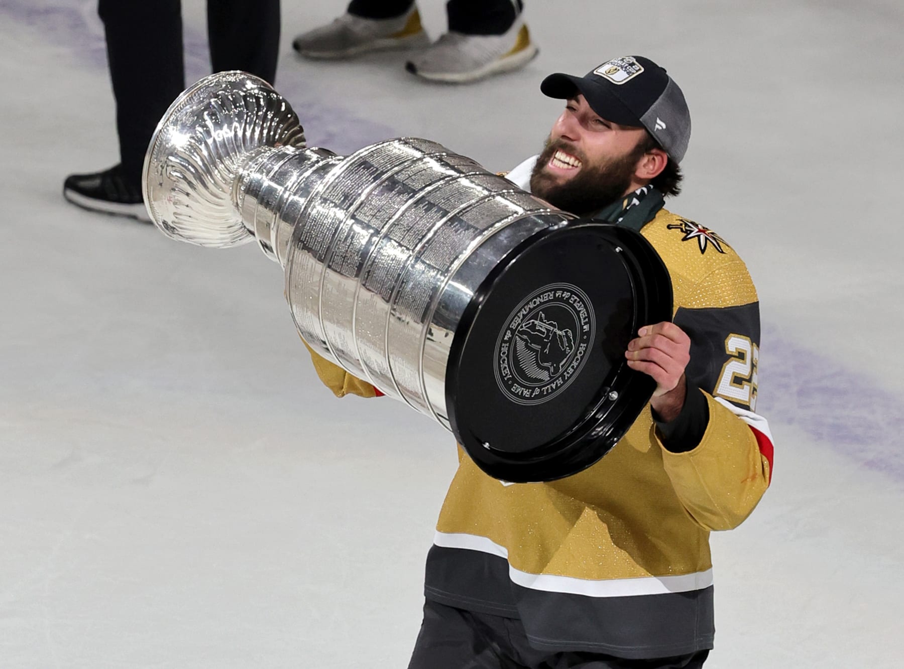 LAS VEGAS, NEVADA - JUNE 13: Michael Amadio #22 of the Vegas Golden Knights hoists the Stanley Cup after the team's 9-3 victory over the Florida Panthers in Game Five of the 2023 NHL Stanley Cup Final at T-Mobile Arena on June 13, 2023 in Las Vegas, Nevada. The Golden Knights won the series four games to one. (Photo by Ethan Miller/Getty Images)