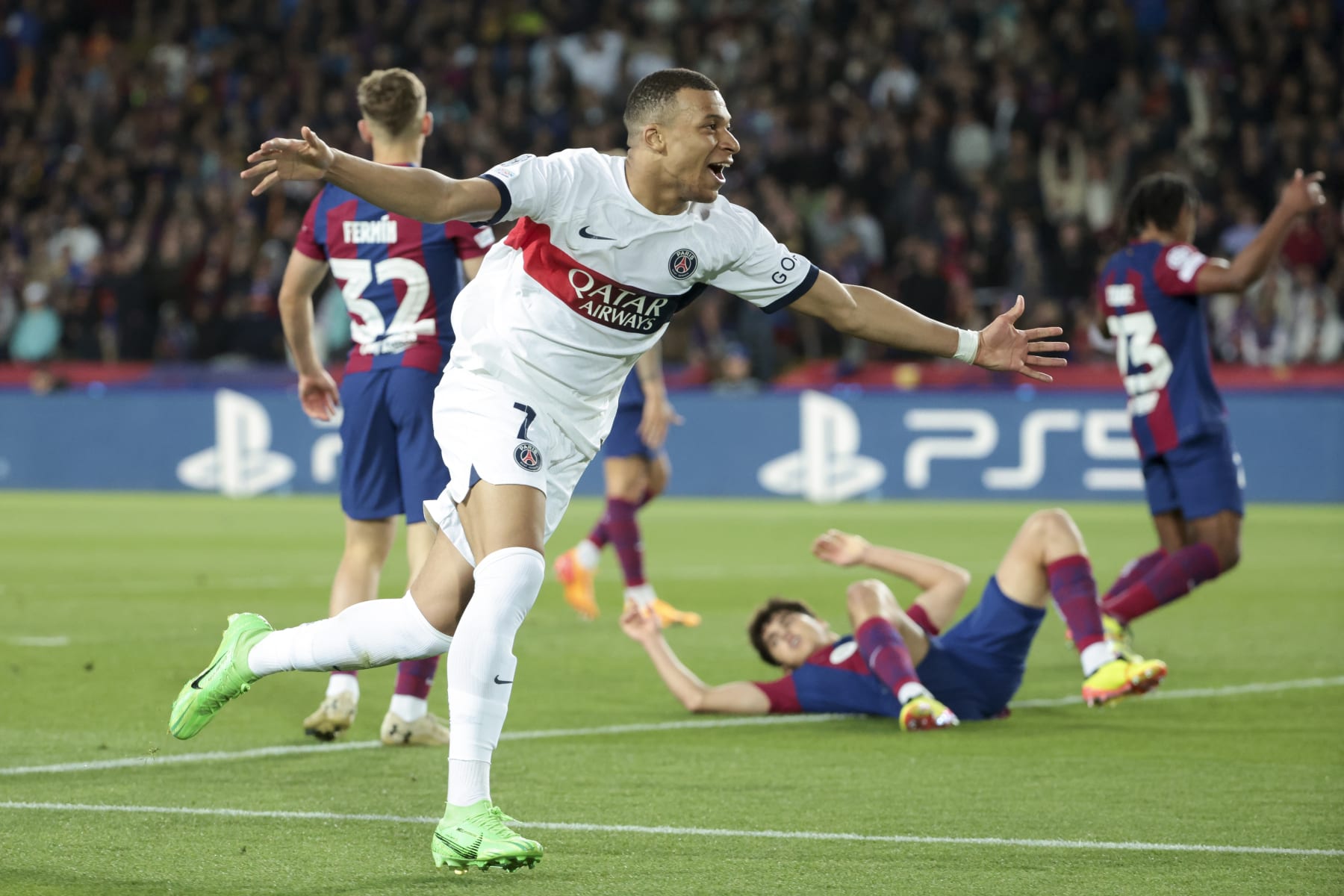 BARCELONA, SPAIN - APRIL 16: Kylian Mbappe of PSG celebrates his second goal and 4th goal for PSG during the UEFA Champions League quarter-final second leg match between FC Barcelona (Barca) and Paris Saint-Germain (PSG) at Estadi Olimpic Lluis Companys on April 16, 2024 in Barcelona, Spain.(Photo by Jean Catuffe/Getty Images)