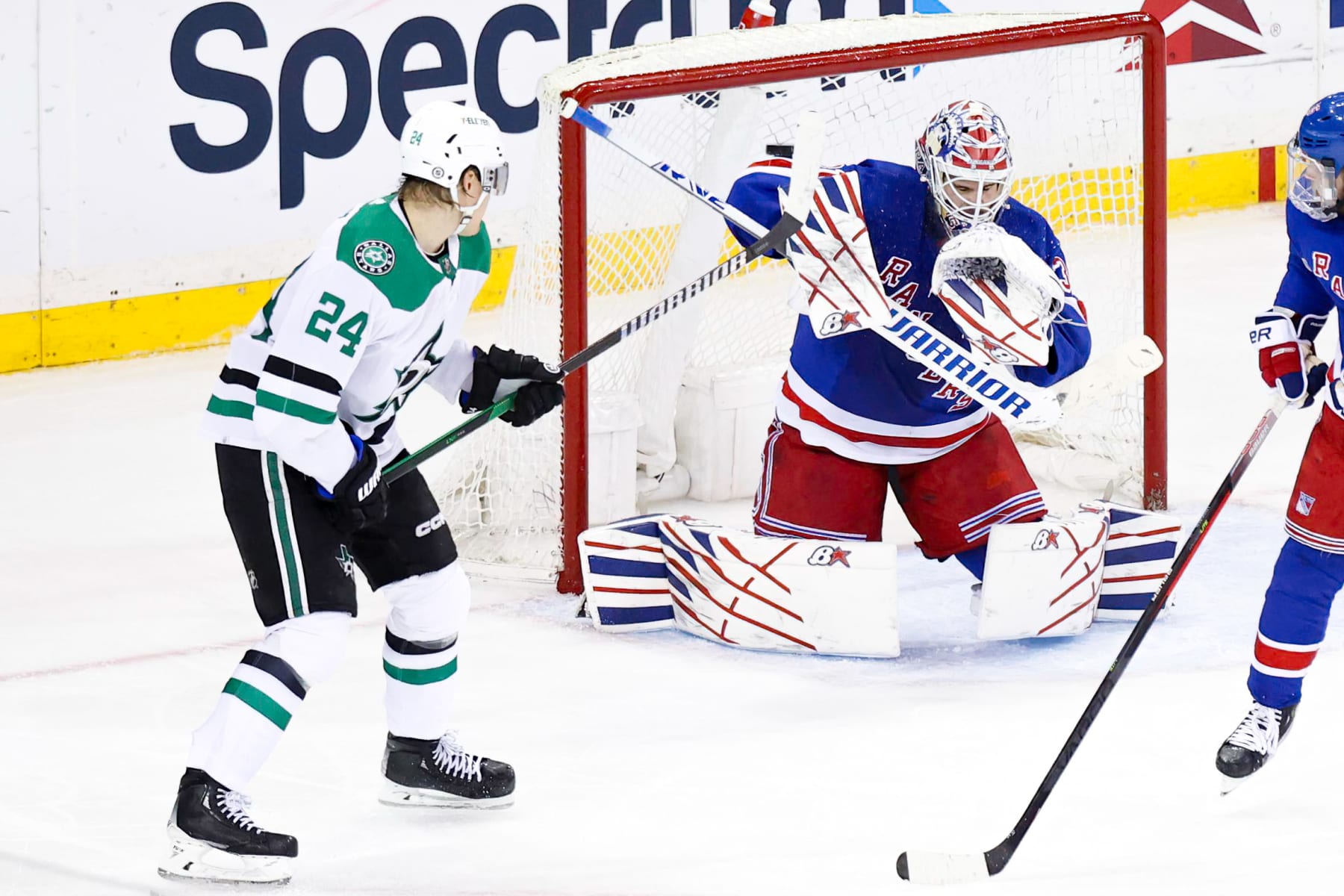 NEW YORK, NY - FEBRUARY 20: New York Rangers Goalie Igor Shesterkin (31) just gets a piece of a shot on goal to deflect it over the crossbar during the third period of the National Hockey League game between the Dallas Stars and the New York Rangers on February 19, 2024 at Madison Square Garden in New York, NY. (Photo by Joshua Sarner/Icon Sportswire via Getty Images)
