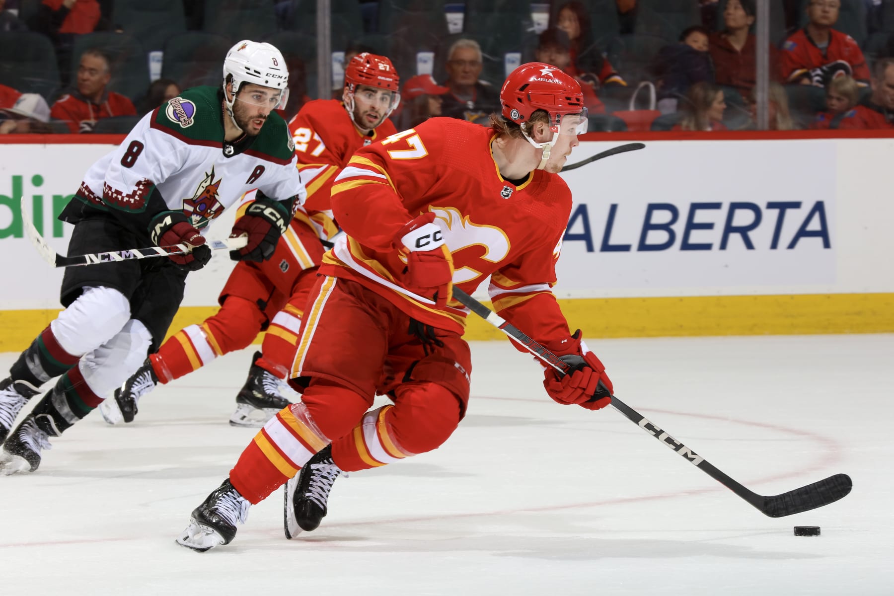 CALGARY, ALBERTA - APRIL 14: Connor Zary #47 of the Calgary Flames skates against the Arizona Coyotes at the Scotiabank Saddledome on April 14, 2024 in Calgary, Alberta. (Photo by Gerry Thomas/NHLI via Getty Images)