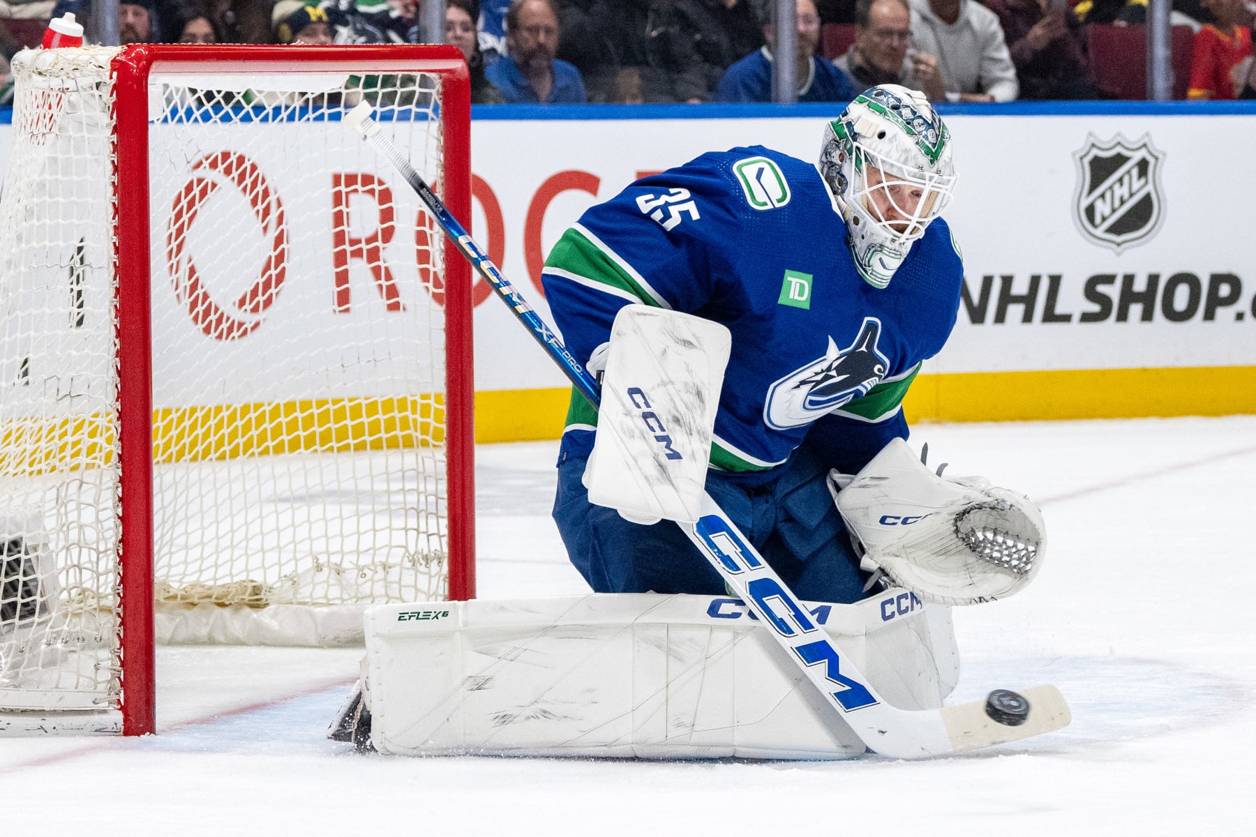 VANCOUVER, BC - APRIL 16: Vancouver Canucks goaltender Thatcher Demko (35) stops the puck during an NHL game between the Calgary Flames and the Vancouver Canucks on, Tuesday, April 16, 2024 at Rogers Arena in Vancouver, B.C. (Photo by Ethan Cairns/Icon Sportswire via Getty Images)