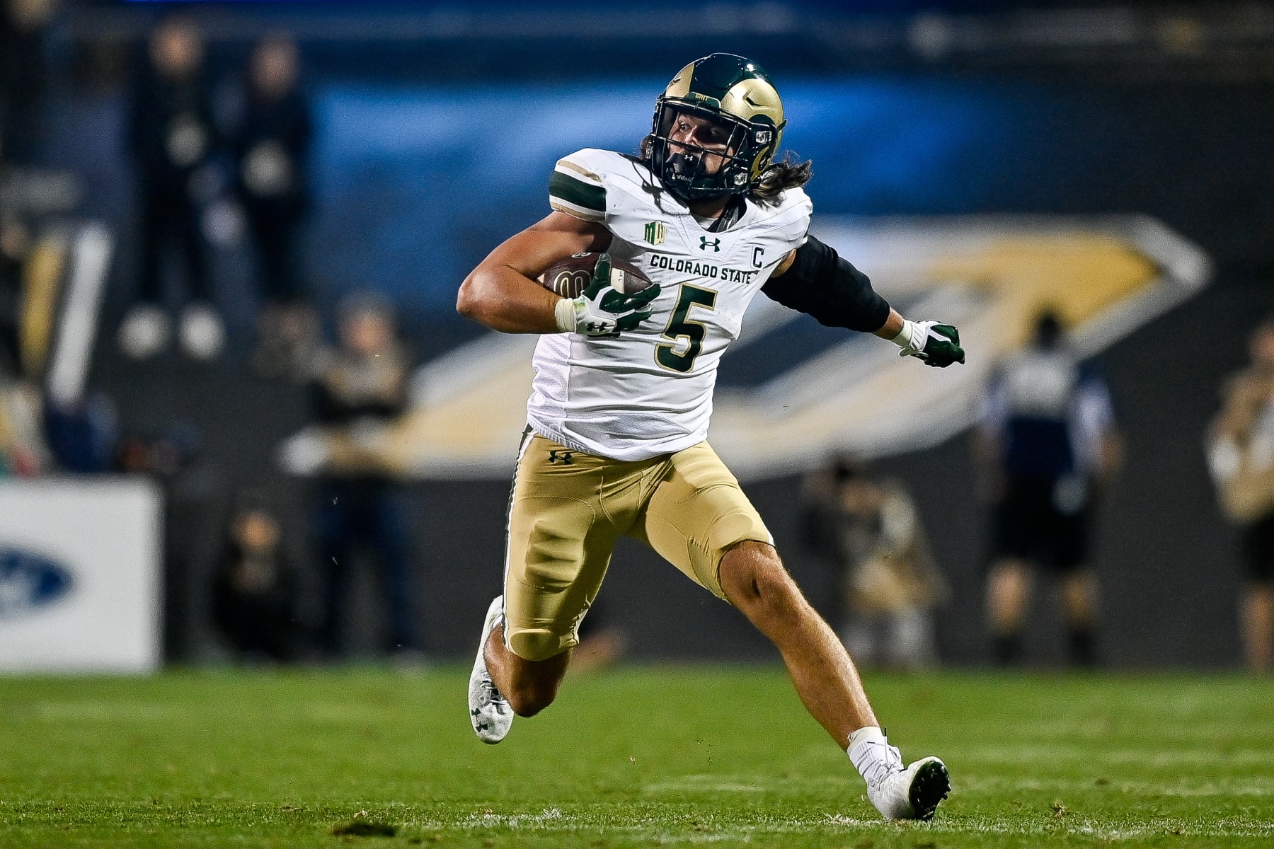 BOULDER, CO - SEPTEMBER 16:  Tight end Dallin Holker #5 of the Colorado State Rams runs after a catch and gains 19 yards and a first down in the third quarter against the Colorado Buffaloes at Folsom Field on September 16, 2023 in Boulder, Colorado. (Photo by Dustin Bradford/Getty Images)