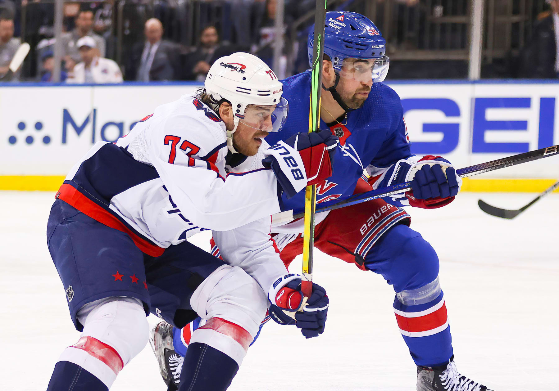 NEW YORK, NY - APRIL 21: Washington Capitals Right Wing T.J. Oshie (77) skates against New York Rangers Defenseman Erik Gustafsson (56) during the third period of the National Hockey League Stanley Cup Playoffs Eastern Conference First Round game between the Washington Capitals and the New York Rangers on April 21, 2024 at Madison Square Garden in New York, NY. (Photo by Joshua Sarner/Icon Sportswire via Getty Images)