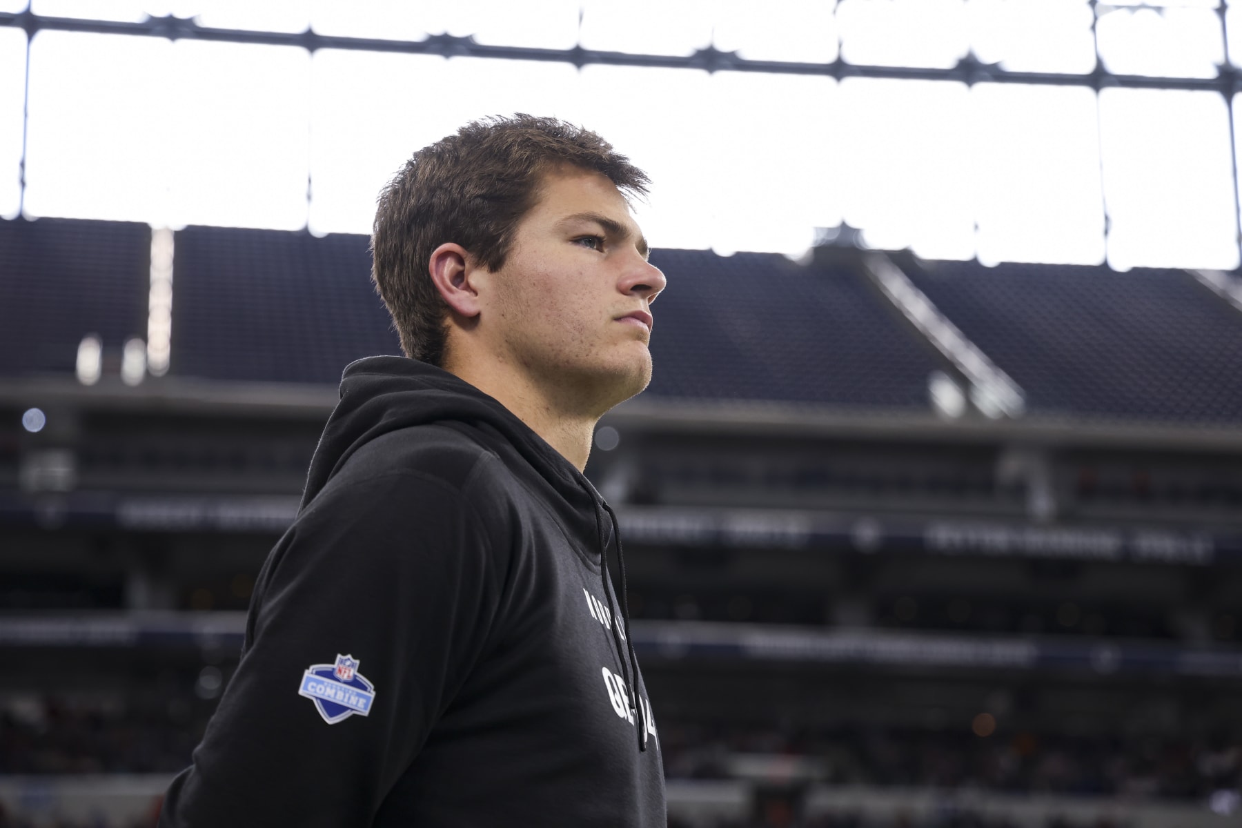 INDIANAPOLIS, INDIANA - MARCH 2: Drake Maye #QB04 of North Carolina watches drills during the NFL Scouting Combine at Lucas Oil Stadium on March 2, 2024 in Indianapolis, Indiana. (Photo by Kara Durrette/Getty Images)