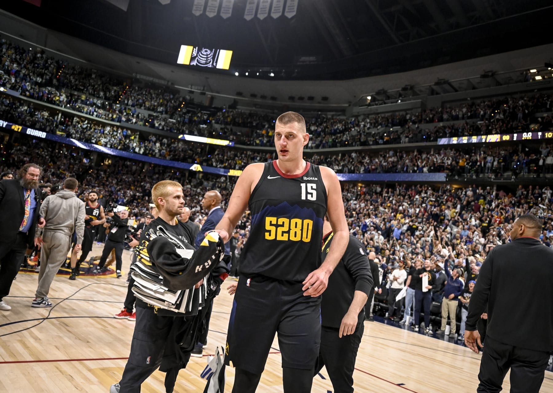 DENVER, CO - APRIL 22: Nikola Jokic (15) of the Denver Nuggets prepares to wipe away his sweat after the fourth quarter of the Nuggets' 101-99 win over the Los Angeles Lakers at Ball Arena in Denver on Monday, April 22, 2024. (Photo by AAron Ontiveroz/The Denver Post)