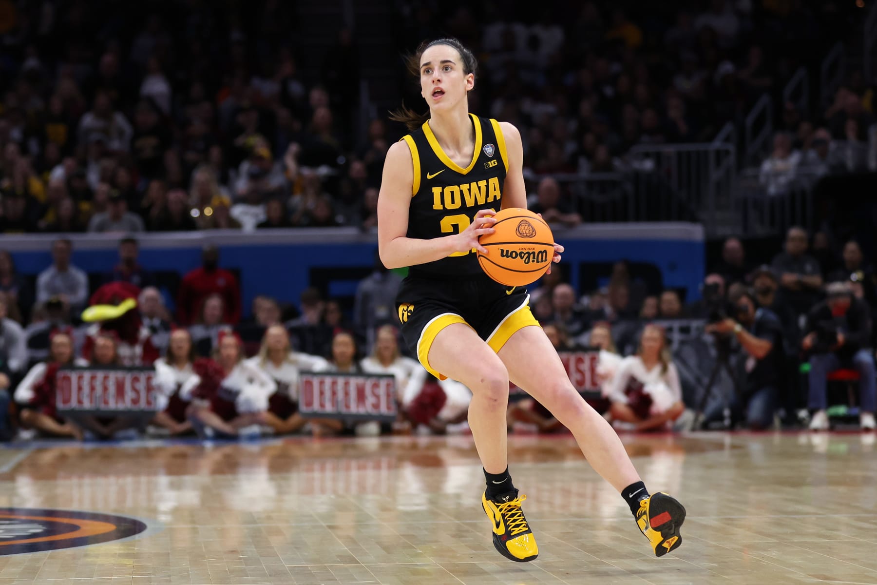 CLEVELAND, OHIO - APRIL 07: Caitlin Clark #22 of the Iowa Hawkeyes looks on in the second half during the 2024 NCAA Women's Basketball Tournament National Championship game against the South Carolina Gamecocks at Rocket Mortgage FieldHouse on April 07, 2024 in Cleveland, Ohio. (Photo by Steph Chambers/Getty Images)