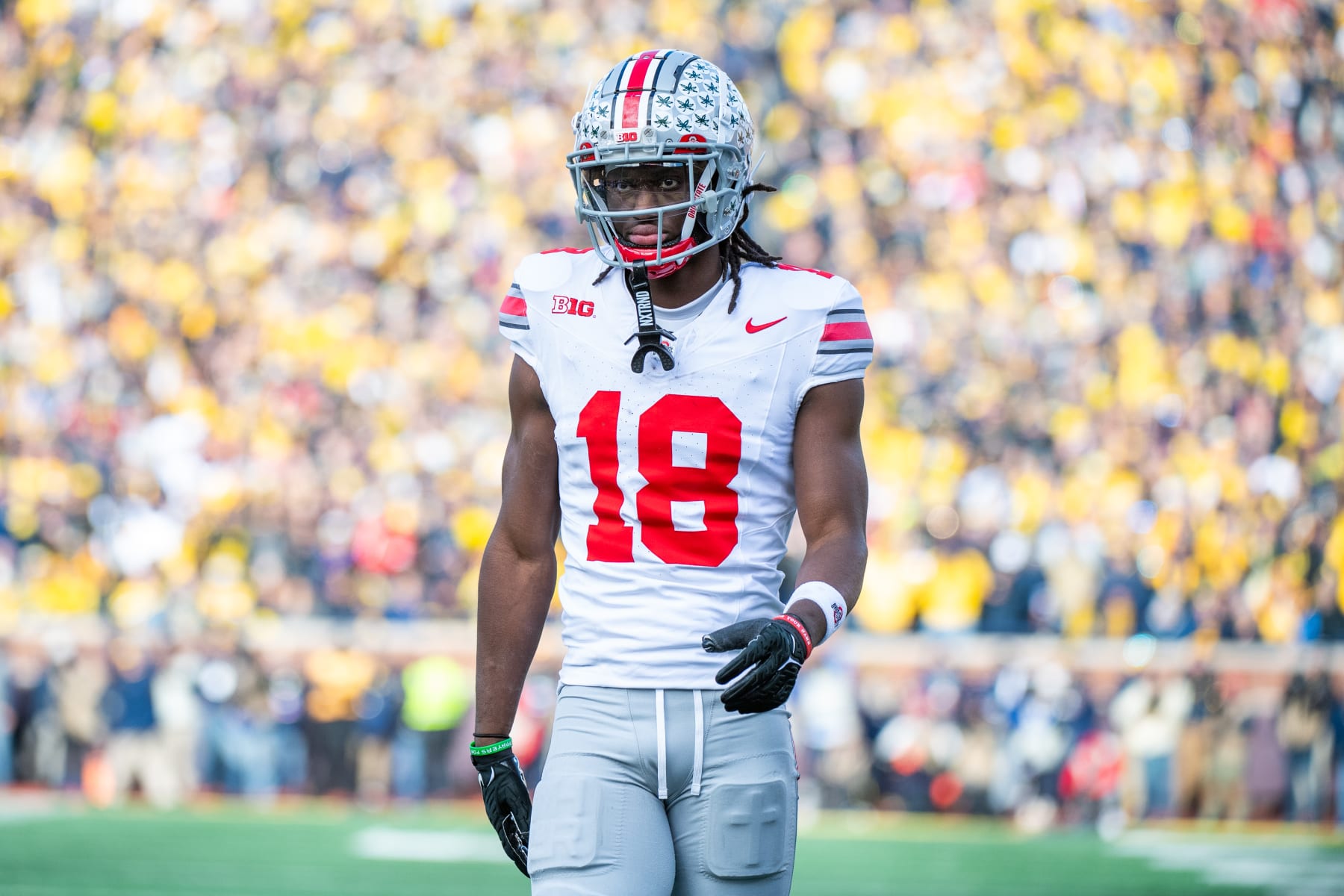 ANN ARBOR, MICHIGAN - NOVEMBER 25: Marvin Harrison Jr. #18 of the Ohio State Buckeyes walks up the field during the second half of a college football game against the Michigan Wolverines at Michigan Stadium on November 25, 2023 in Ann Arbor, Michigan. The Michigan Wolverines won the game 30-24 to win the Big Ten East. (Photo by Aaron J. Thornton/Getty Images)