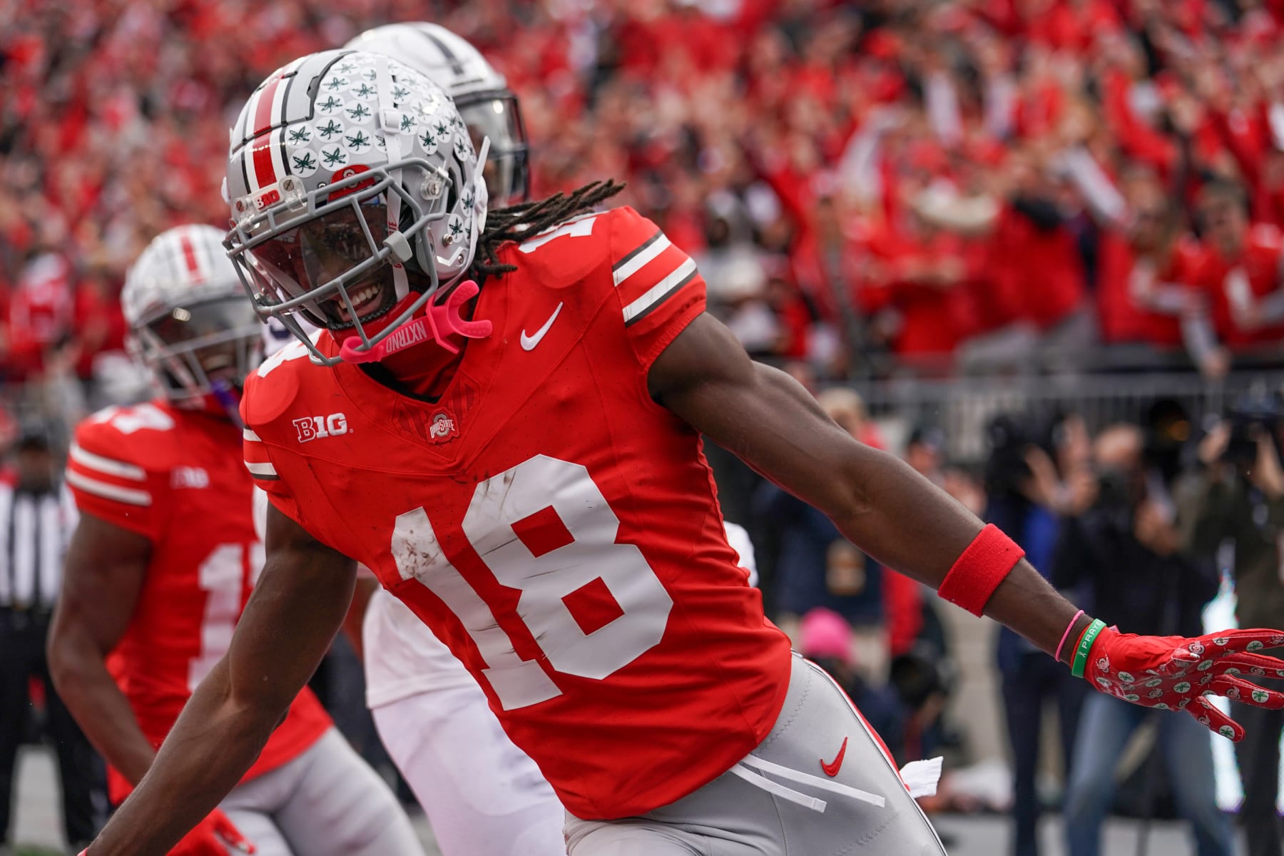 COLUMBUS, OH - OCTOBER 21: Wide receiver Marvin Harrison Jr. #18 of the Ohio State Buckeyes celebrates a touchdown during the game against the Penn State Nittany Lionsat Ohio Stadium in Columbus, Ohio on October 21, 2023. (Photo by Jason Mowry/Icon Sportswire via Getty Images)