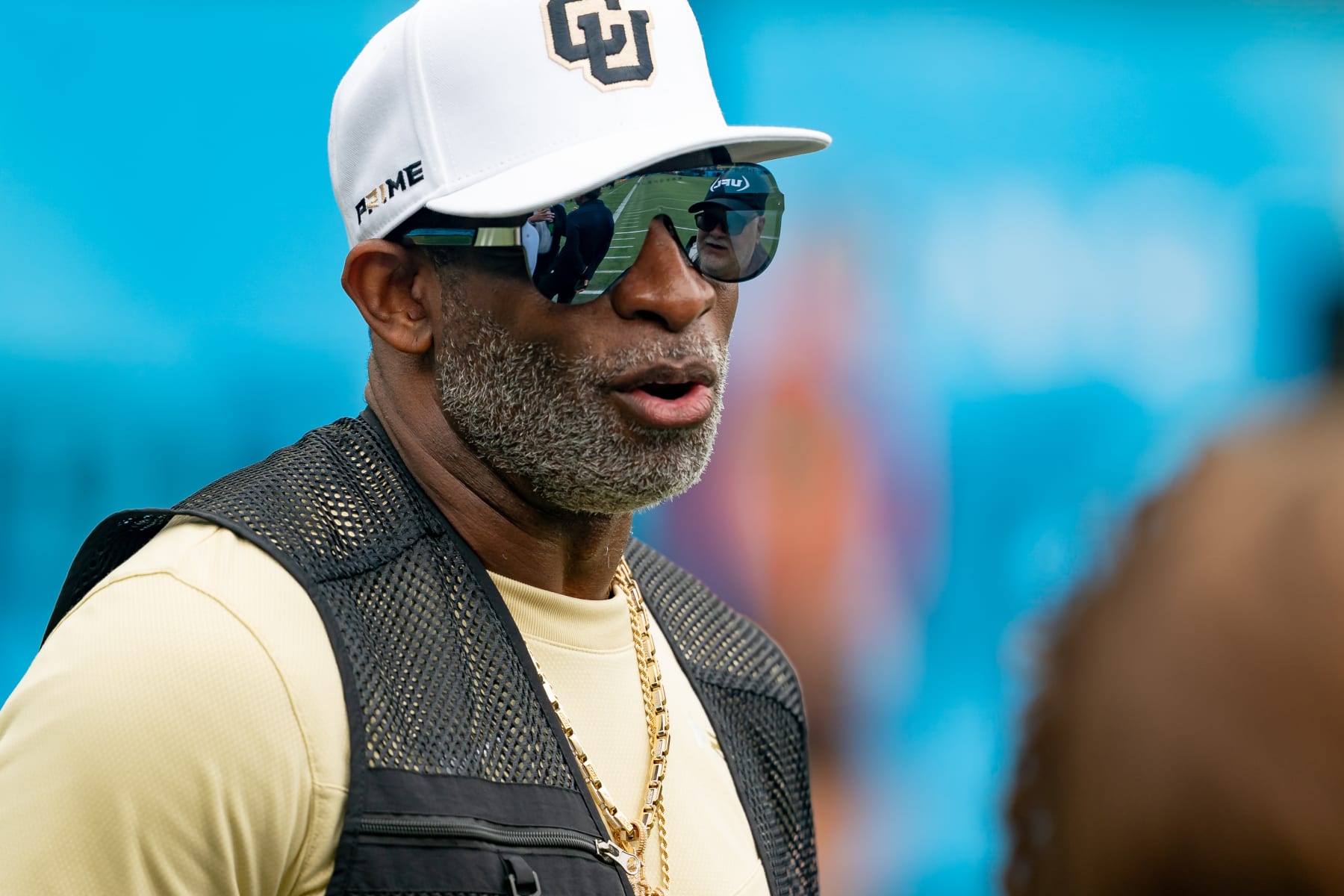 ARLINGTON, TX - MARCH 30:University of Colorado Coach Deion Sanders talks with people on the field before  a UFL game between the Birmingham Stallions and the Arlington Renegades on March 30, 2024 at Choctaw Stadium in Arlington, TX. (Photo by Chris Leduc/Icon Sportswire via Getty Images)