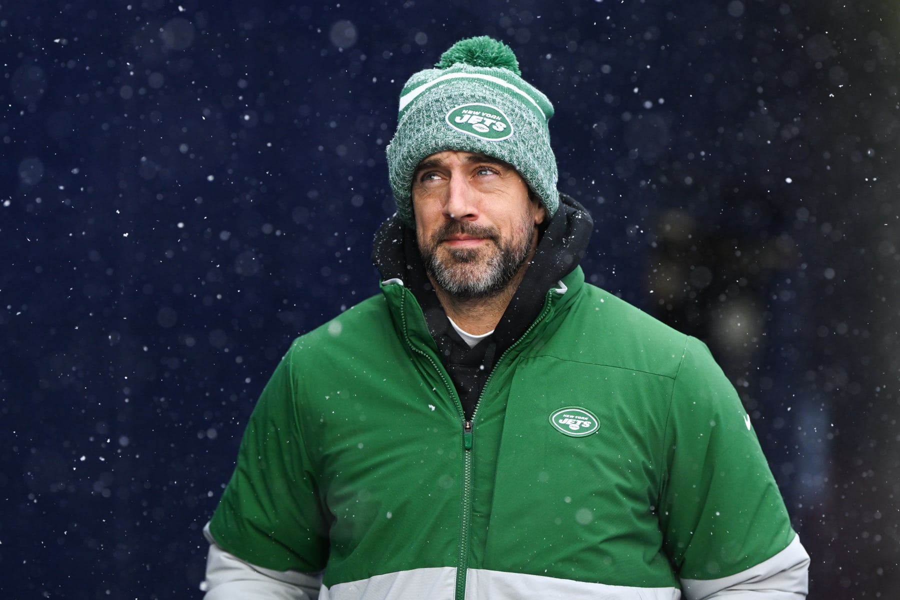 FOXBOROUGH, MA - JANUARY 7: Aaron Rodgers #8 of the New York Jets runs onto the field prior to the start of the game against the New England Patriots at Gillette Stadium on January 7, 2024 in Foxborough, Massachusetts. (Photo by Kathryn Riley/Getty Images)