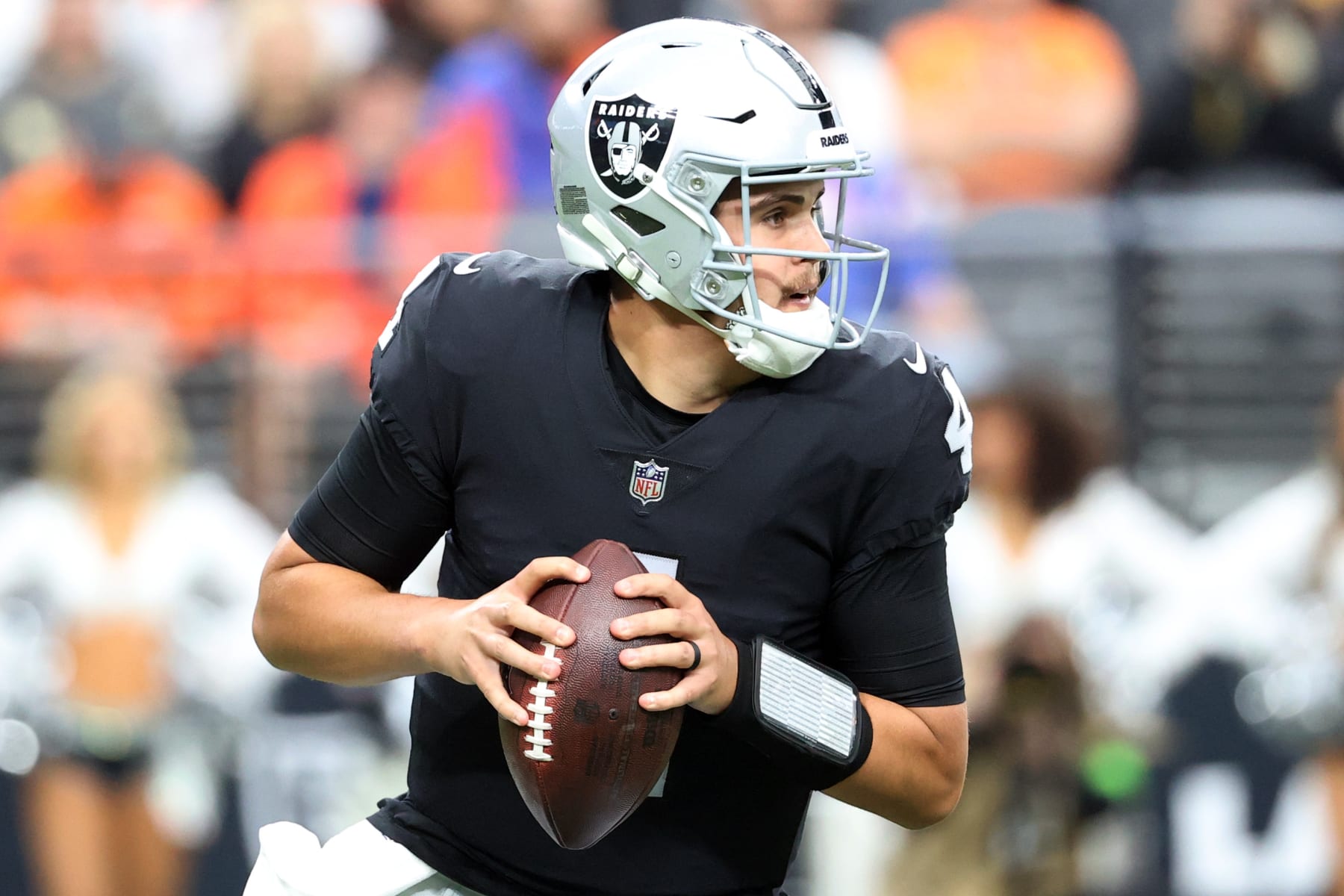 LAS VEGAS, NEVADA - JANUARY 07: Aidan O'Connell #4 of the Las Vegas Raiders looks to pass during the first quarter in the game against the Denver Broncos at Allegiant Stadium on January 07, 2024 in Las Vegas, Nevada. (Photo by Ian Maule/Getty Images)