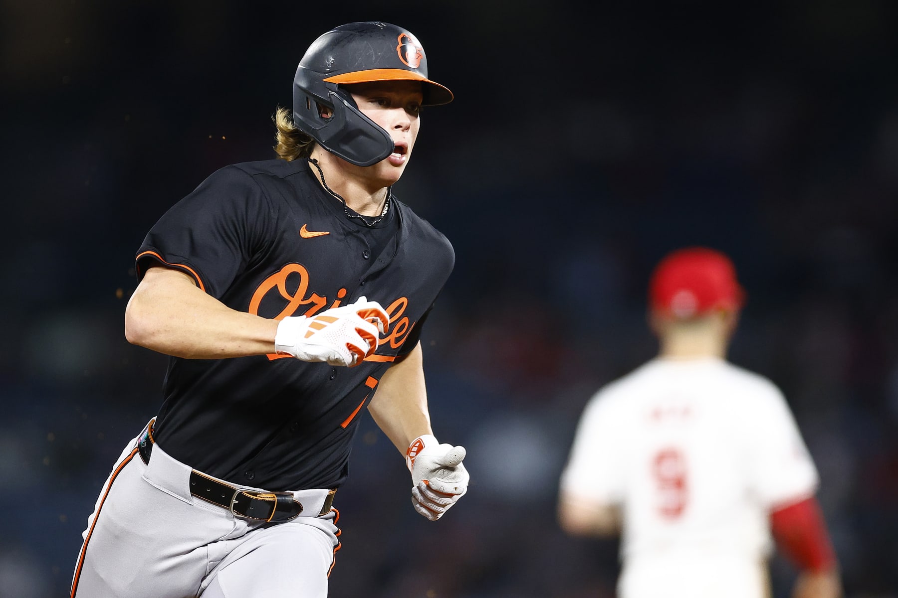 ANAHEIM, CALIFORNIA - APRIL 23:  Jackson Holliday #7 of the Baltimore Orioles runs to third base against the Los Angeles Angels in the fifth inning at Angel Stadium of Anaheim on April 23, 2024 in Anaheim, California. (Photo by Ronald Martinez/Getty Images)