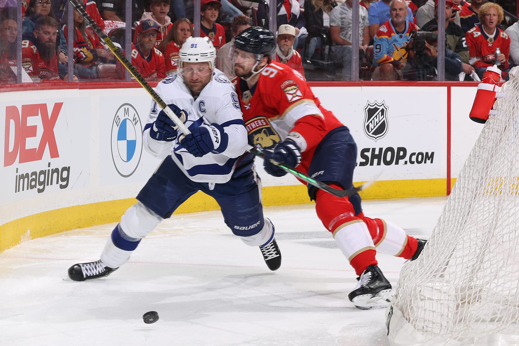 SUNRISE, FL - APRIL 23: Oliver Ekman-Larsson #91 of the Florida Panthers and Steven Stamkos #91 of the Tampa Bay Lightning battle for the puck in the first period of Game Two in the First Round of the 2024 Stanley Cup Playoffs at the Amerant Bank Arena on April 23, 2024 in Sunrise, Florida. (Photo by Joel Auerbach/Getty Images)