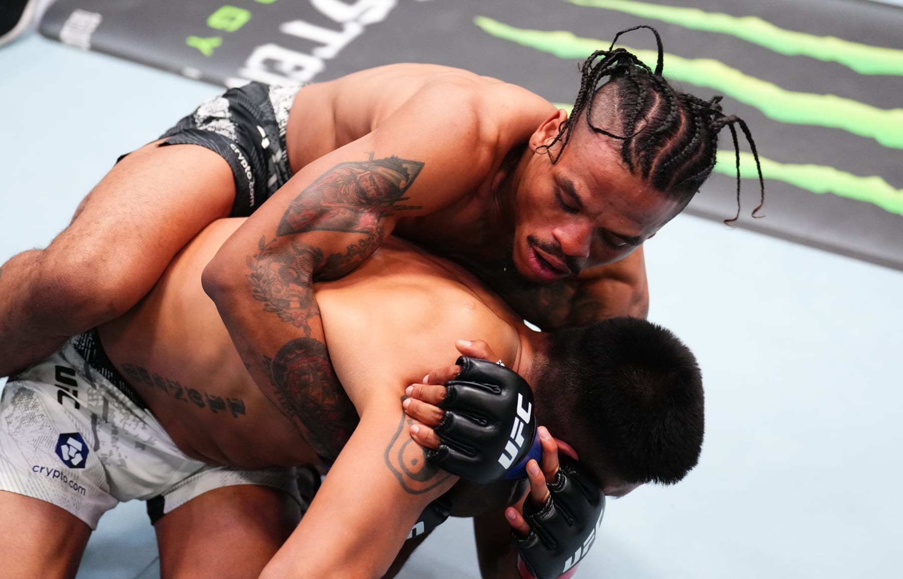 LAS VEGAS, NEVADA - APRIL 27: (L-R) Chris Padilla grapples James Llontop of Peru in a lightweight bout during the UFC Fight Night event at UFC APEX on April 27, 2024 in Las Vegas, Nevada. (Photo by Chris Unger/Zuffa LLC via Getty Images)