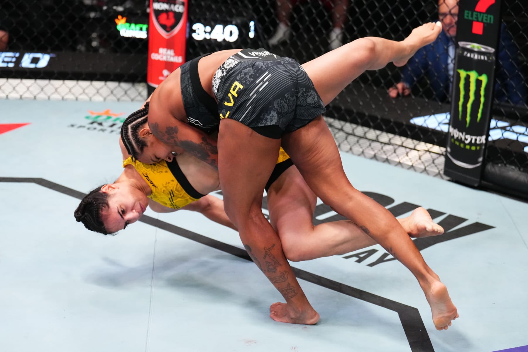 LAS VEGAS, NEVADA - APRIL 27: (R-L) Karine Silva of Brazil takes down Ariane da Silva of Brazil in a flyweight bout during the UFC Fight Night event at UFC APEX on April 27, 2024 in Las Vegas, Nevada. (Photo by Chris Unger/Zuffa LLC via Getty Images)