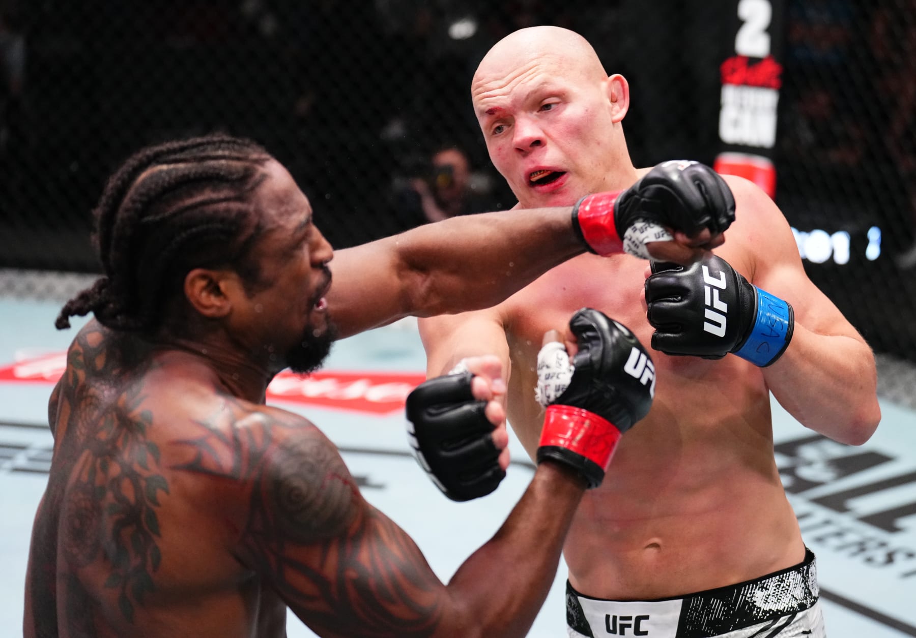 LAS VEGAS, NEVADA - APRIL 27: (R-L) Bogdan Guskov of Uzbekistan punches Ryan Spann in a light heavyweight bout during the UFC Fight Night event at UFC APEX on April 27, 2024 in Las Vegas, Nevada. (Photo by Chris Unger/Zuffa LLC via Getty Images)