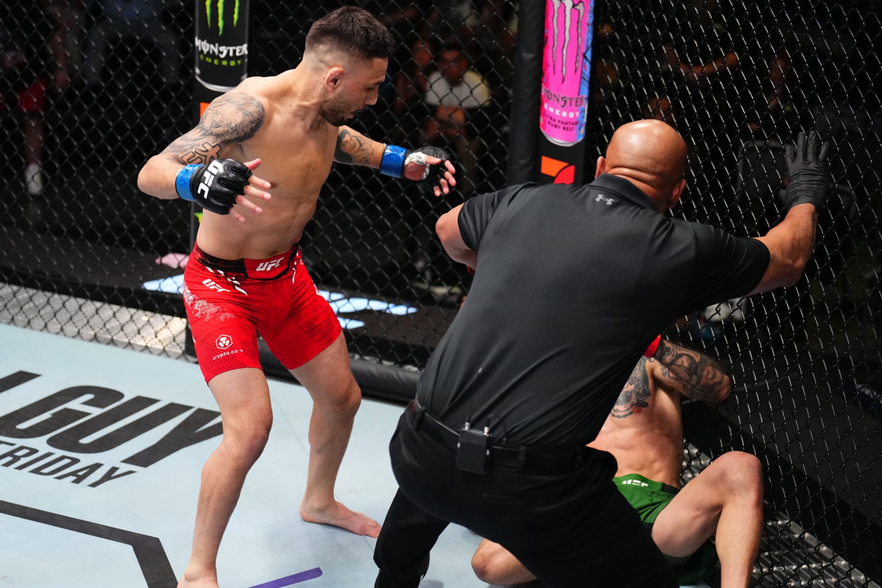 LAS VEGAS, NEVADA - APRIL 27: (L-R) Alex Perez knocks out Matheus Nicolau of Brazil in a flyweight bout during the UFC Fight Night event at UFC APEX on April 27, 2024 in Las Vegas, Nevada. (Photo by Chris Unger/Zuffa LLC via Getty Images)