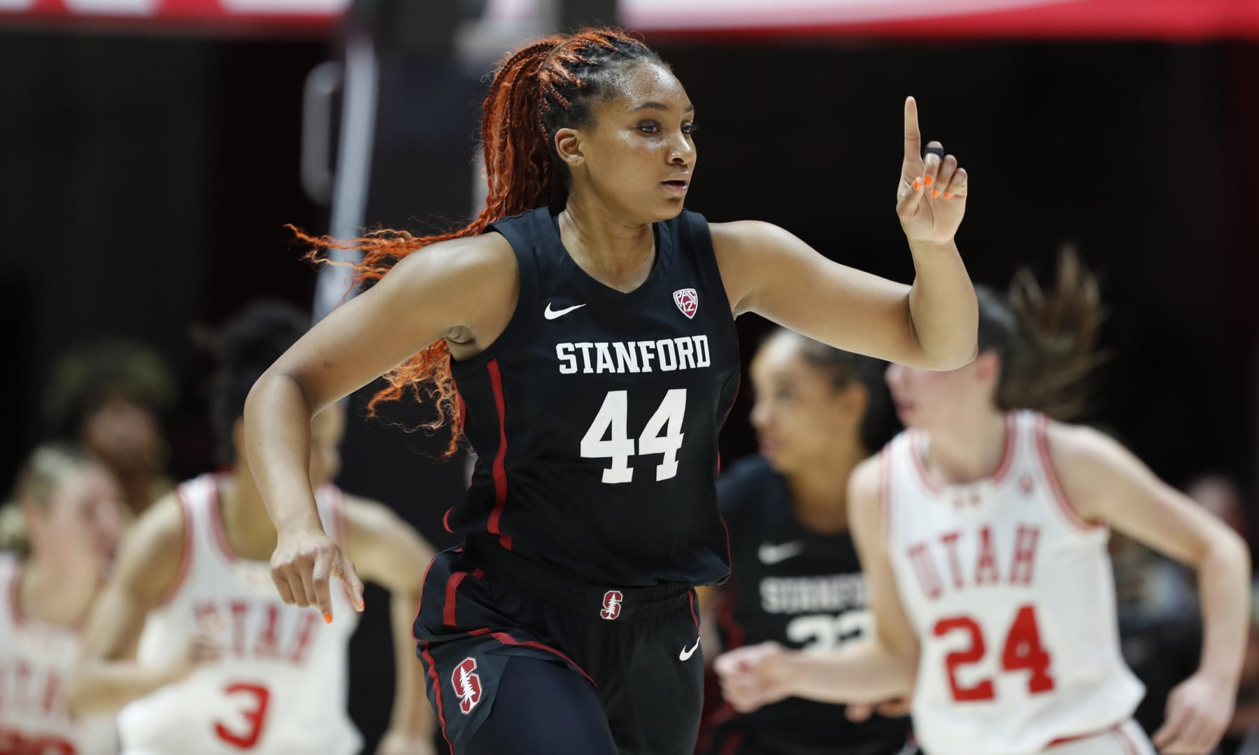SALT LAKE CITY, UT - JANUARY 12: Kiki Iriafen #44 of the Stanford Cardinal celebrates a score against the Utah Utes during the second half of their game at the Jon M Huntsman Center on January 12, 2024 in Salt Lake City, Utah. (Photo by Chris Gardner/Getty Images)