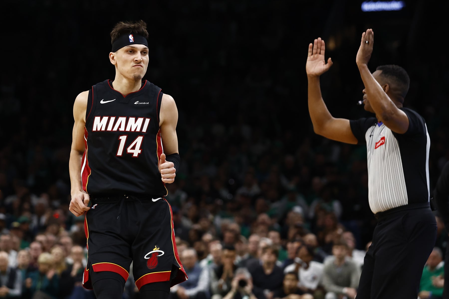 BOSTON, MA - APRIL 24: Tyler Herro #14 of the Miami Heat looks at his bench after making a three-point basket against the Boston Celtics during the second quarter of game two of the Eastern Conference First Round Playoffs at TD Garden on April 24, 2024 in Boston, Massachusetts. NOTE TO USER: User expressly acknowledges and agrees that, by downloading and/or using this Photograph, user is consenting to the terms and conditions of the Getty Images License Agreement. (Photo By Winslow Townson/Getty Images)