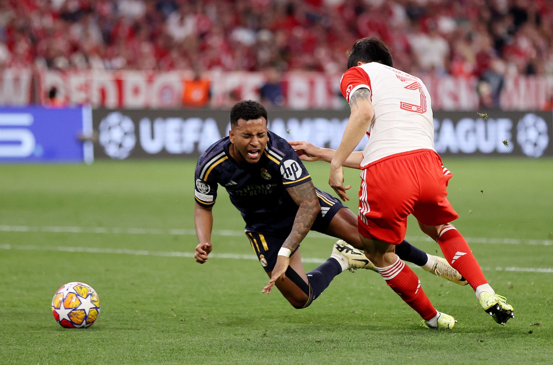 MUNICH, GERMANY - APRIL 30: Rodrygo of Real Madrid is fouled by Kim Min-Jae of Bayern Munich which results in a penalty during the UEFA Champions League semi-final first leg match between FC Bayern München and Real Madrid at Allianz Arena on April 30, 2024 in Munich, Germany. (Photo by Alex Pantling/Getty Images)