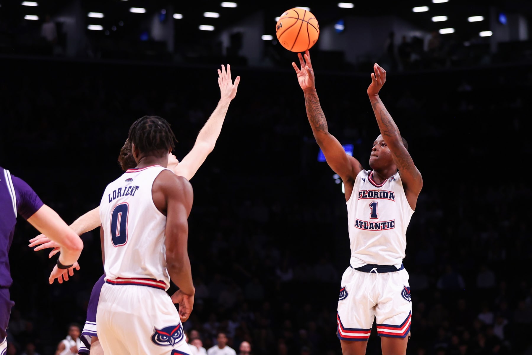NEW YORK, NEW YORK - MARCH 22: Johnell Davis #1 of the Florida Atlantic Owls shoots the ball during the first half of the game against the Northwestern Wildcats during the first round of the NCAA Men’s Basketball Tournament at Barclays Center on March 22, 2024 in New York City. (Photo by Jamie Schwaberow/NCAA Photos via Getty Images)
