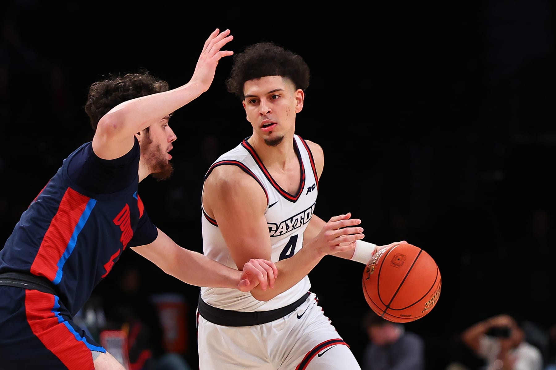 BROOKLYN, NY - MARCH 14:  Koby Brea #4 of the Dayton Flyers controls the ball during the first half of the Atlantic 10 Championship tournament game against the Duquesne Dukes on March 14, 2024 at Barclays Center in Brooklyn, New York.  (Photo by Rich Graessle/Icon Sportswire via Getty Images)