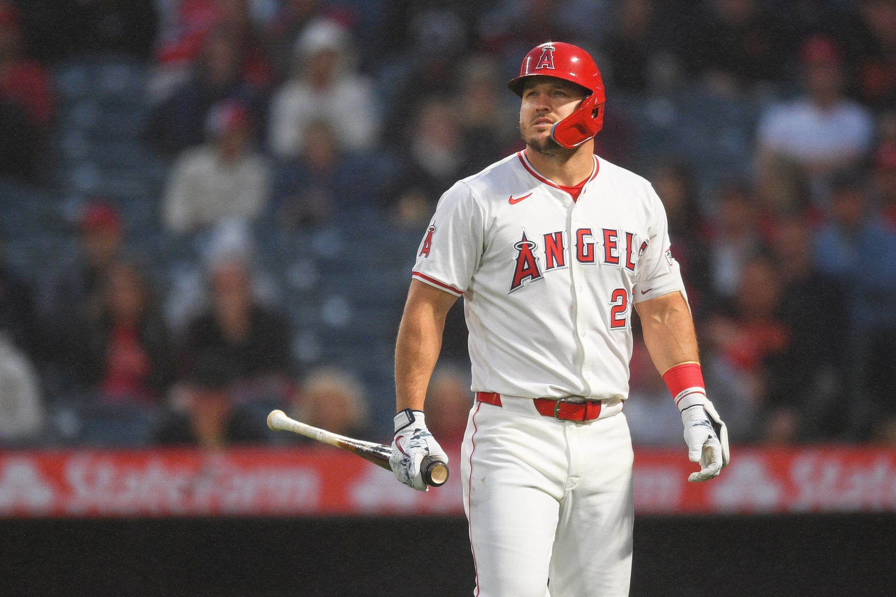 ANAHEIM, CA - APRIL 22: Los Angeles Angels Center field Mike Trout (27) walks back to the dugout after striking out with a runner on base during the MLB game between the Baltimore Orioles and the Los Angeles Angels of Anaheim on April 22, 2024 at Angel Stadium of Anaheim in Anaheim, CA. (Photo by Brian Rothmuller/Icon Sportswire via Getty Images)
