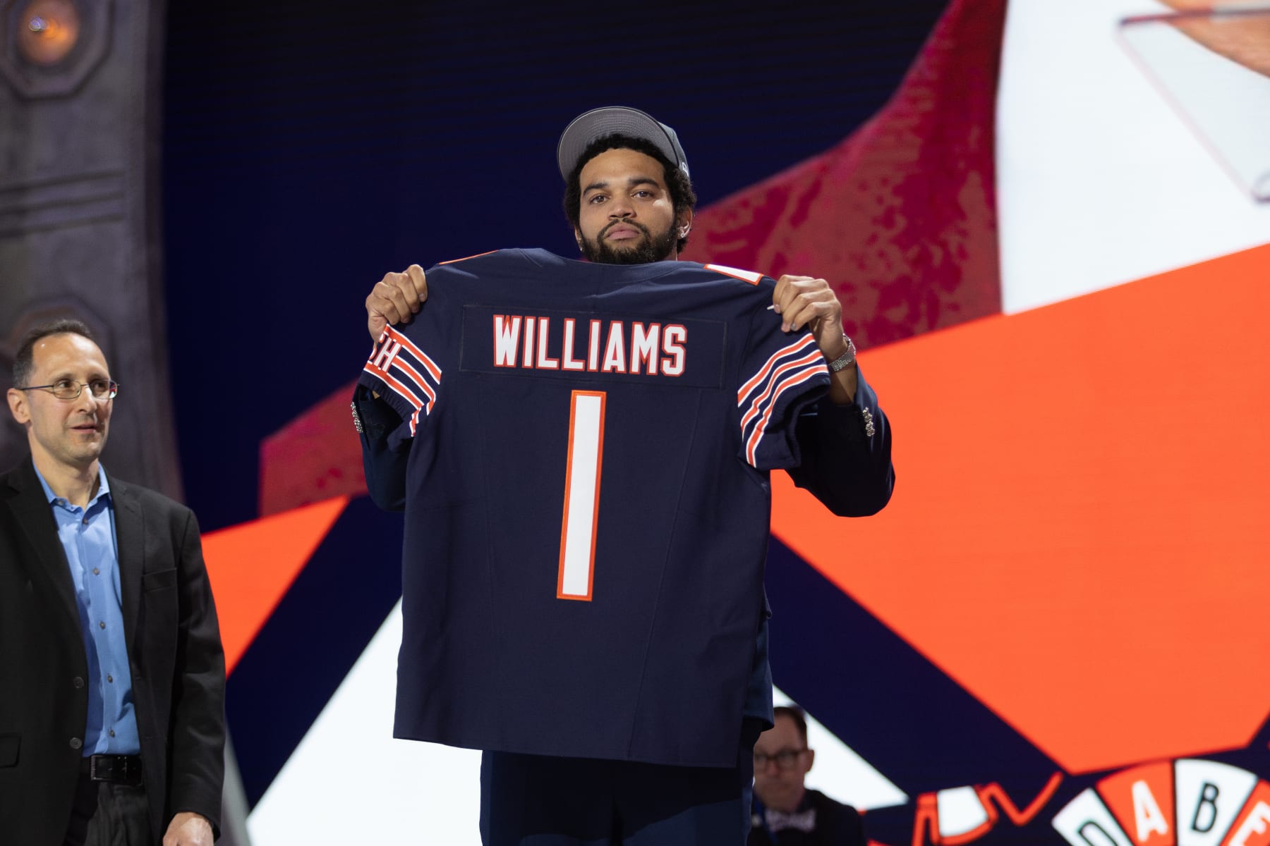 DETROIT, MI - APRIL 25: USC Quarterback Caleb Williams poses with his jersey after being taken first overall by the Chicago Bears during day 1 of the NFL Draft on April 25, 2024 at Fox Theatre in Detroit, MI. (Photo by John Smolek/Icon Sportswire via Getty Images)