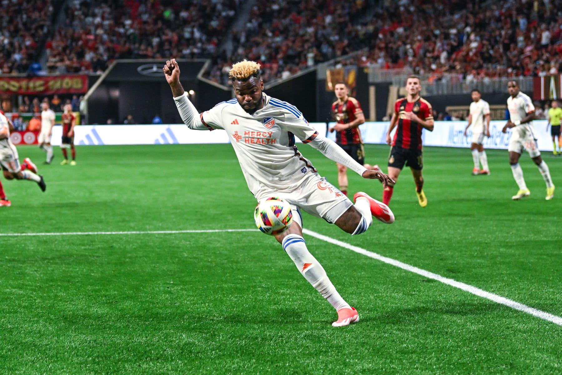ATLANTA, GA  APRIL 20:  Cincinnati forward Aaron Boupendza (9) takes a shot during the MLS match between FC Cincinnati and Atlanta United FC on April 20th, 2024 at Mercedes-Benz Stadium in Atlanta, GA.  (Photo by Rich von Biberstein/Icon Sportswire via Getty Images)