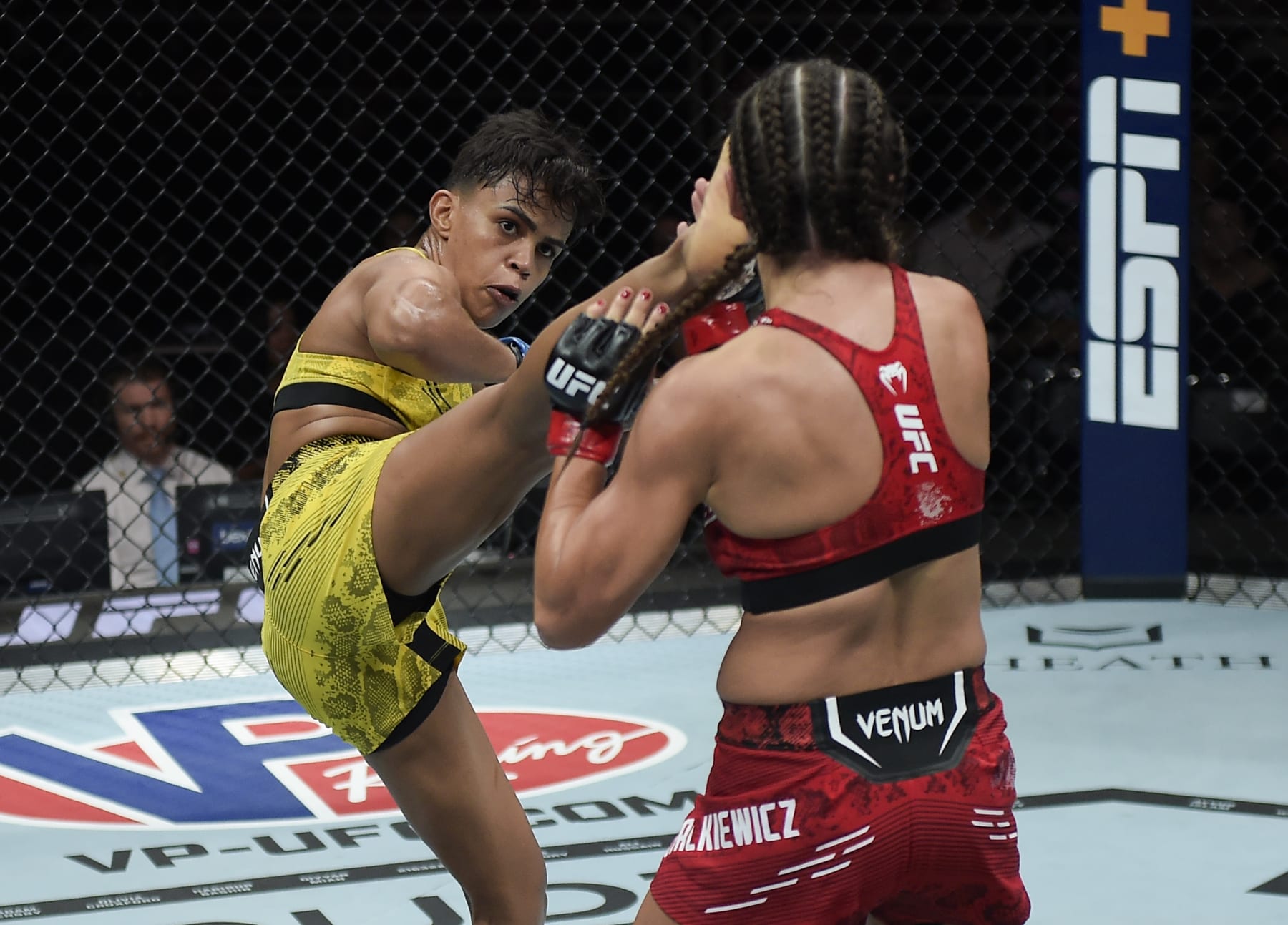 RIO DE JANEIRO, BRAZIL - MAY 04: (L-R) Iasmin Lucindo of Brazil kicks Karolina Kowalkiewicz of Poland in a strawweight bout during the UFC 301 event at Farmasi Arena on May 04, 2024 in Rio de Janeiro, Brazil. (Photo by Alexandre Loureiro/Zuffa LLC via Getty Images)
