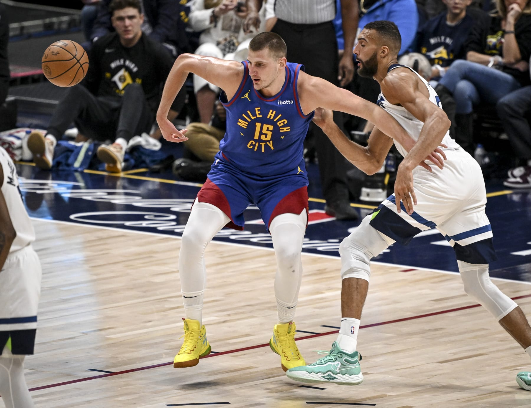DENVER, CO - MAY 4: Rudy Gobert (27) of the Minnesota Timberwolves defends Nikola Jokic (15) of the Denver Nuggets during the first quarter at Ball Arena in Denver on Saturday, May 4, 2024. (Photo by AAron Ontiveroz/The Denver Post)