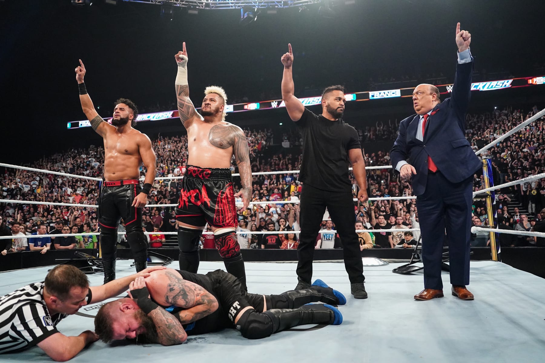 LYON, FRANCE - MAY 4: The NEW Bloodline, Tama Tonga, Solo Sikoa, Tanga Loa and Paul Heyman celebrate their win during Backlash France at LDLC Arena on May 4, 2024 in Lyon, France. (Photo by WWE/Getty Images)