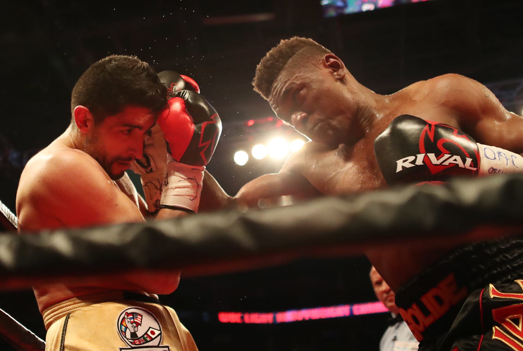 TORONTO, ON- MAY 19 - Montreal's Christian "Solide" Mbilli, black trunks, beats Marco Jesus Cornejo to win the WBC Youth Championship as part of the undercard for Adonis Stevenson versus Badou Jack main event at the Air Canada Centre in Toronto. May 19, 2018. (Steve Russell/Toronto Star via Getty Images)